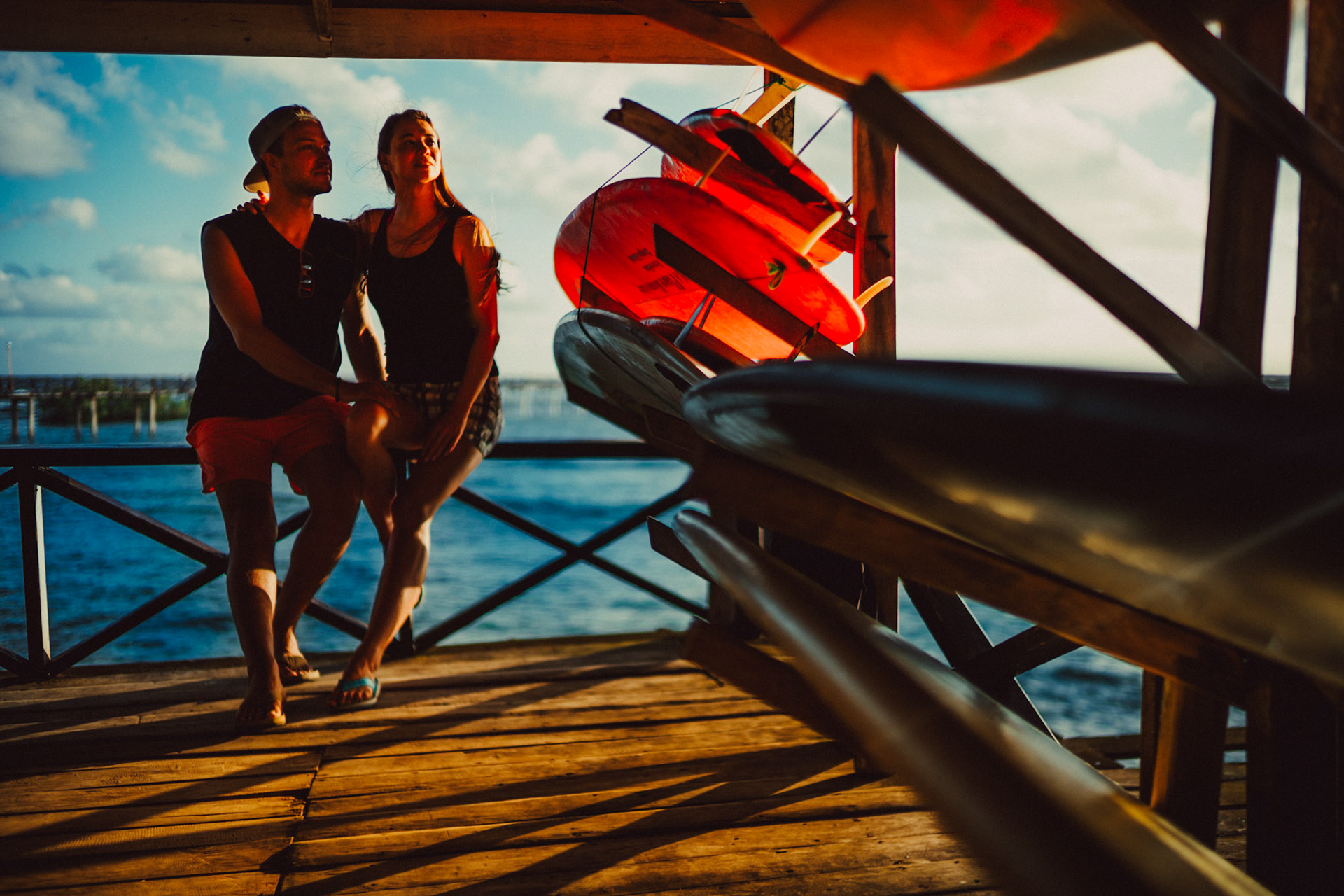 Candid and chill morning couple portraits, in boardshorts, tanktops, surfboards and all, Cloud 9, Siargao Island, Philippines, Southeast Asia, March 2019, Sony A7III.