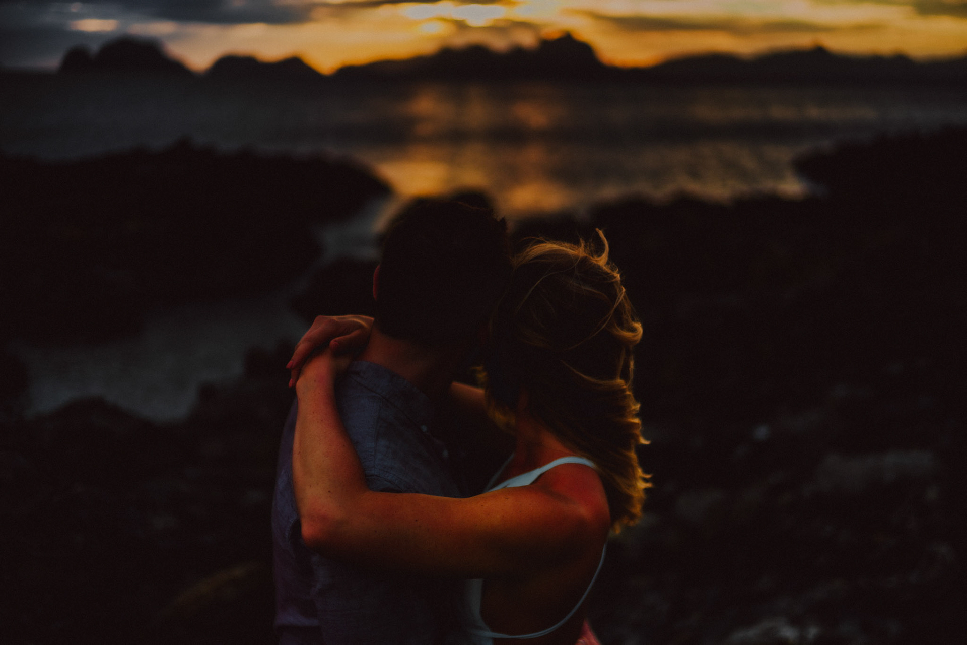 Gloomy and overcast sunset and blue hour couple portraits in Las Cabanas Beach, El Nido Palawan, Philippines, Southeast Asia, March 2019, Sony A7III.