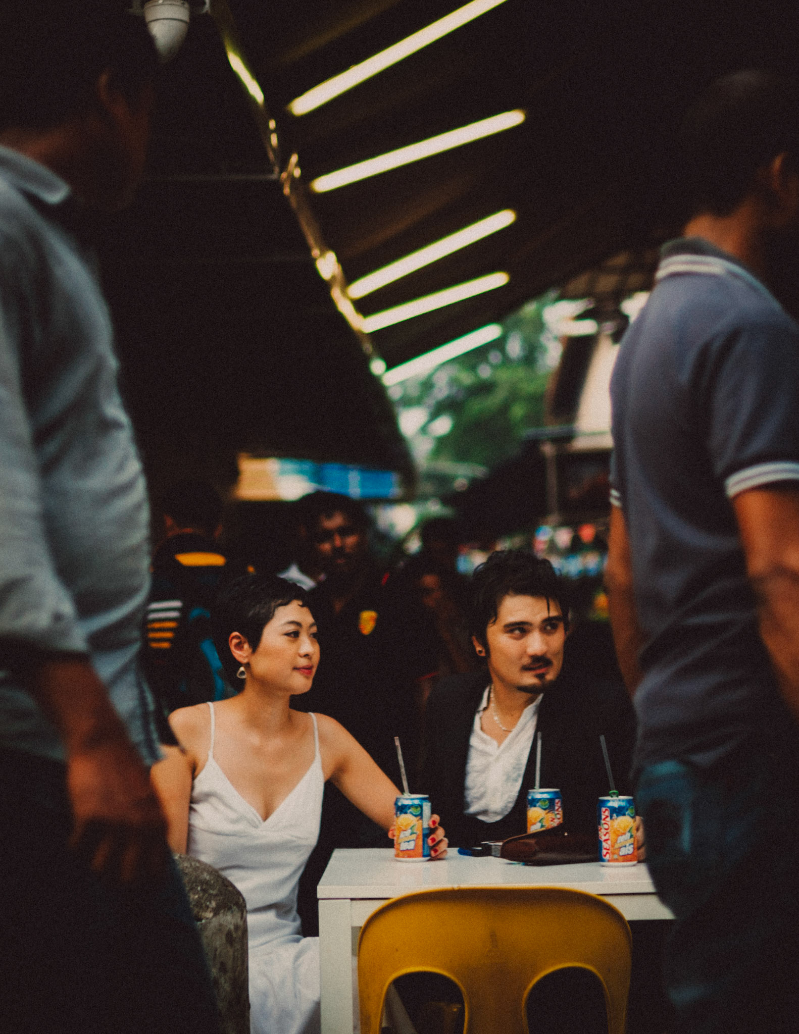 A Japanese couple enjoying a Sunday afternoon in an Indian food stall near Mustafa Centre, from Ibuki and Emi's candid chill engagement shoot in Little India, Singapore, October 2015, Sony A7S.