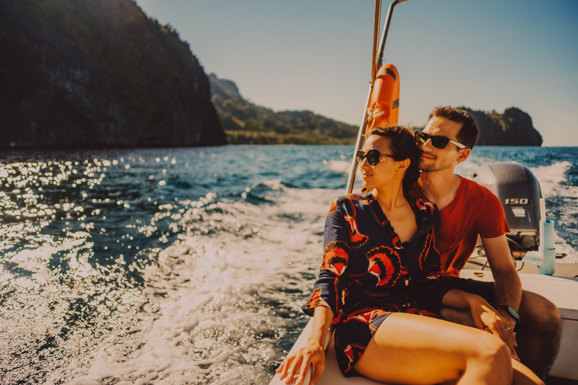 Couple portraits on a speedboat approaching Bukal Beach's idyllic cove, Cadlao Island, El Nido, Palawan, Philippines, Southeast Asia, April 2019, Sony A7III.