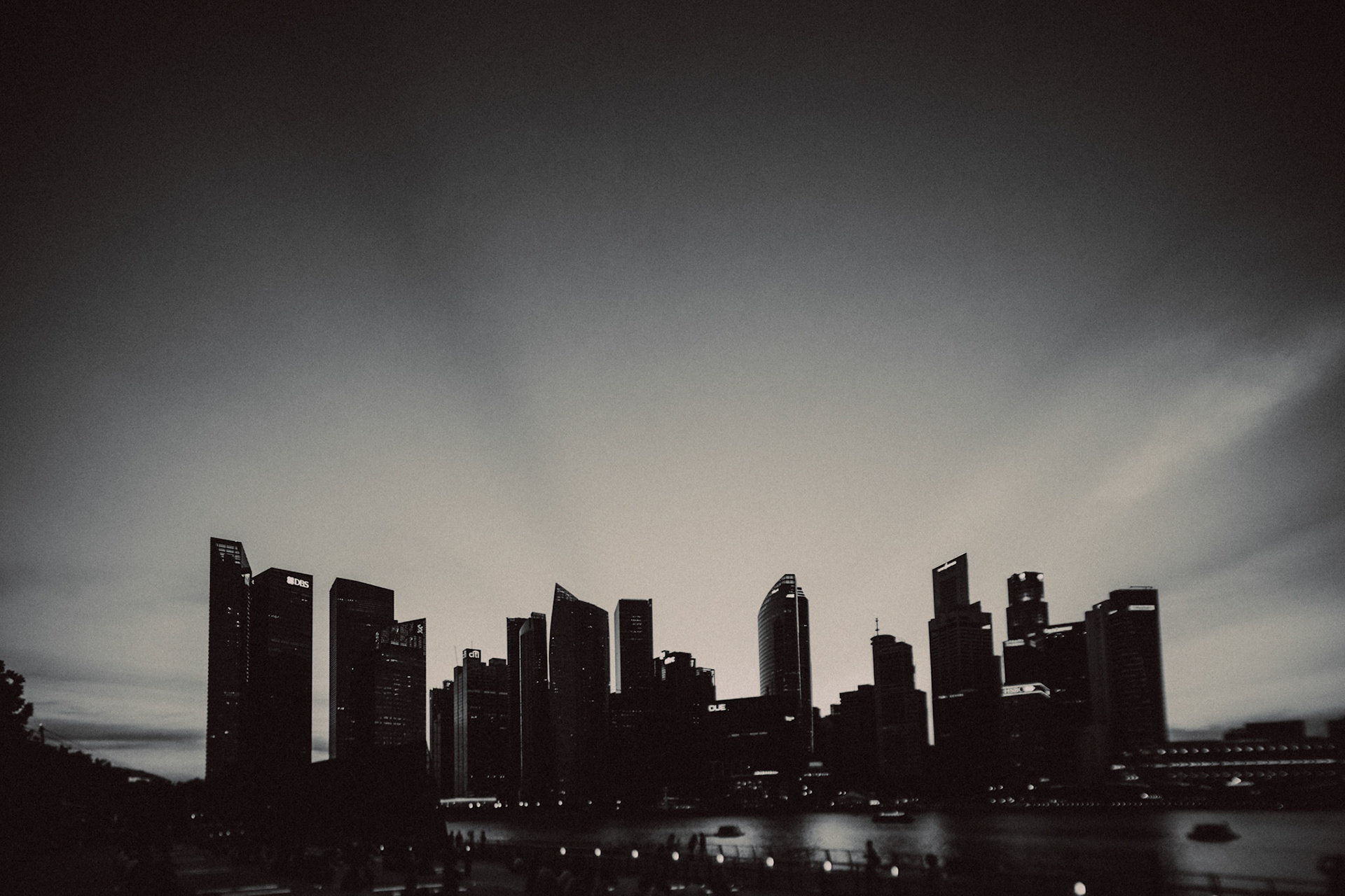 A black and white silhouette of Downtown Singapore from the Marina Bay Sands boardwalk, January 2013, Canon EOS 6D.