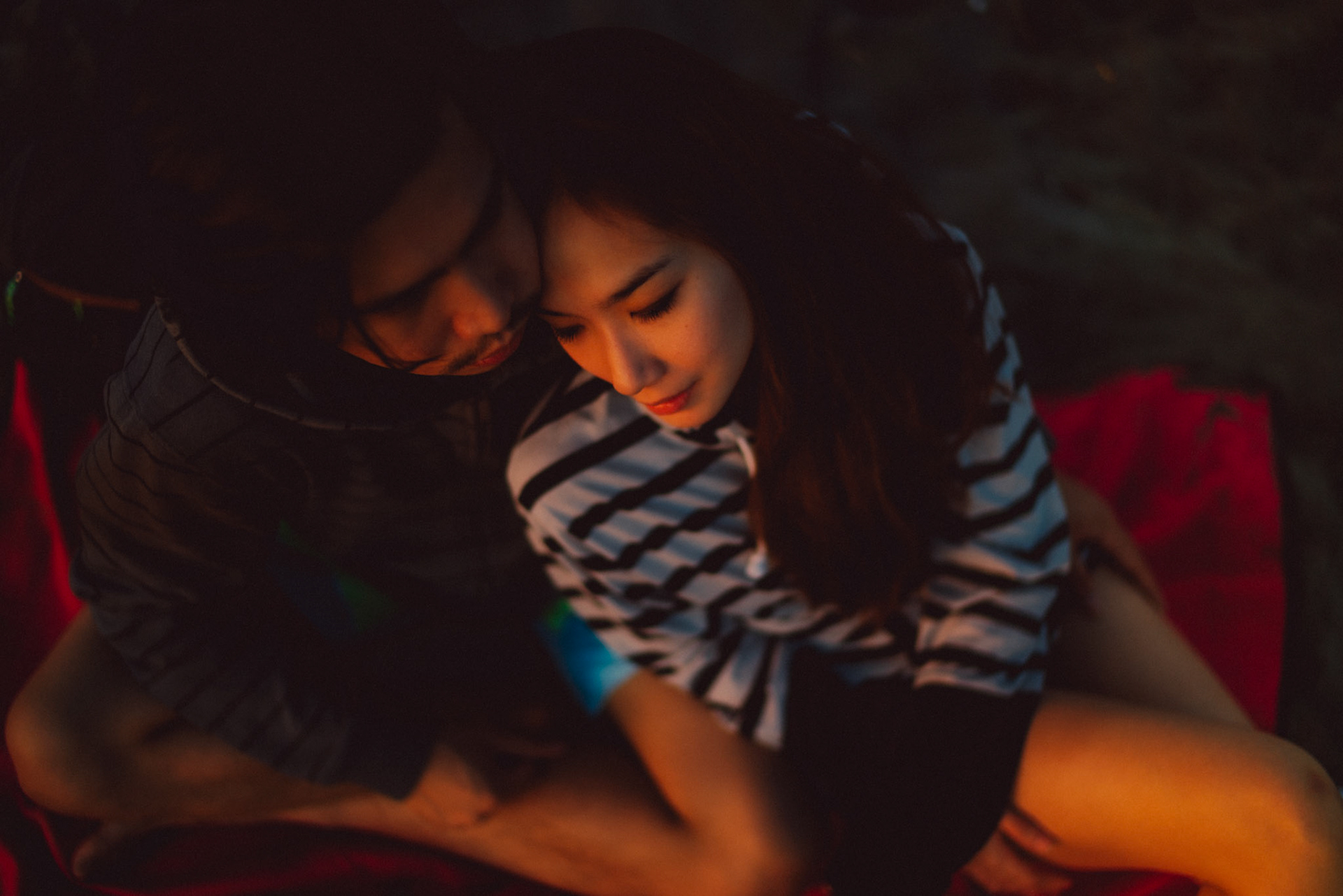 Cozy couple portraits by the beach moments before sunrise, from Koke and Pam's chill and outdoorsy prenup photoshoot in Bonuan Beach, Dagupan, Pangasinan, Philippines, Southeast Asia, November 2015, Sony A7S.