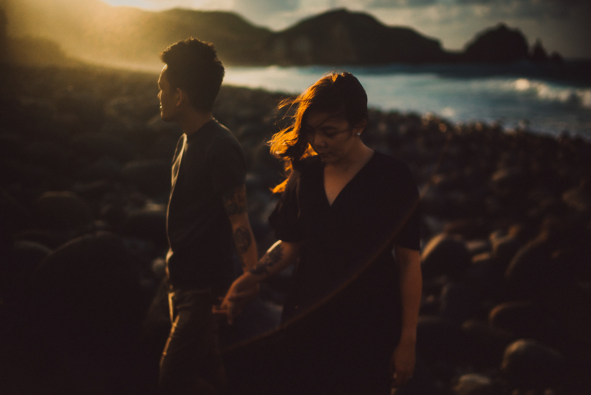 Moody and cinematic couple portraits from Owen and Nikka's adventure prenup photoshoot in Chadpidan Boulder Beach, Batanes, Philippines, October 2017, Leica M.