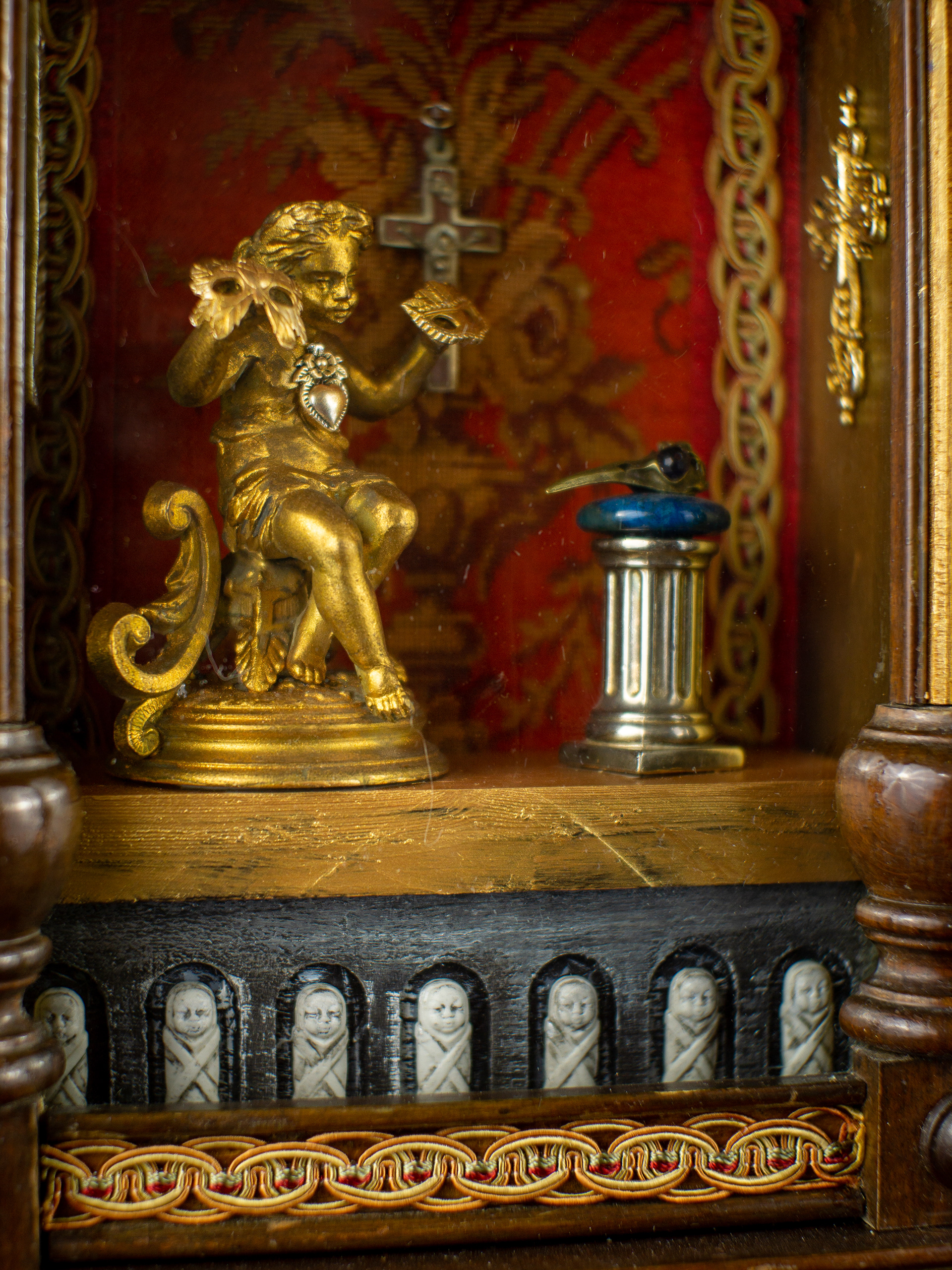 The Vanishing Act - Antique wooden case, antique gilded metal figure, silver, lapis lazuli, amethyst, bisque figures, mixed metals, vintage and antique textiles. 50 x 26 x 13