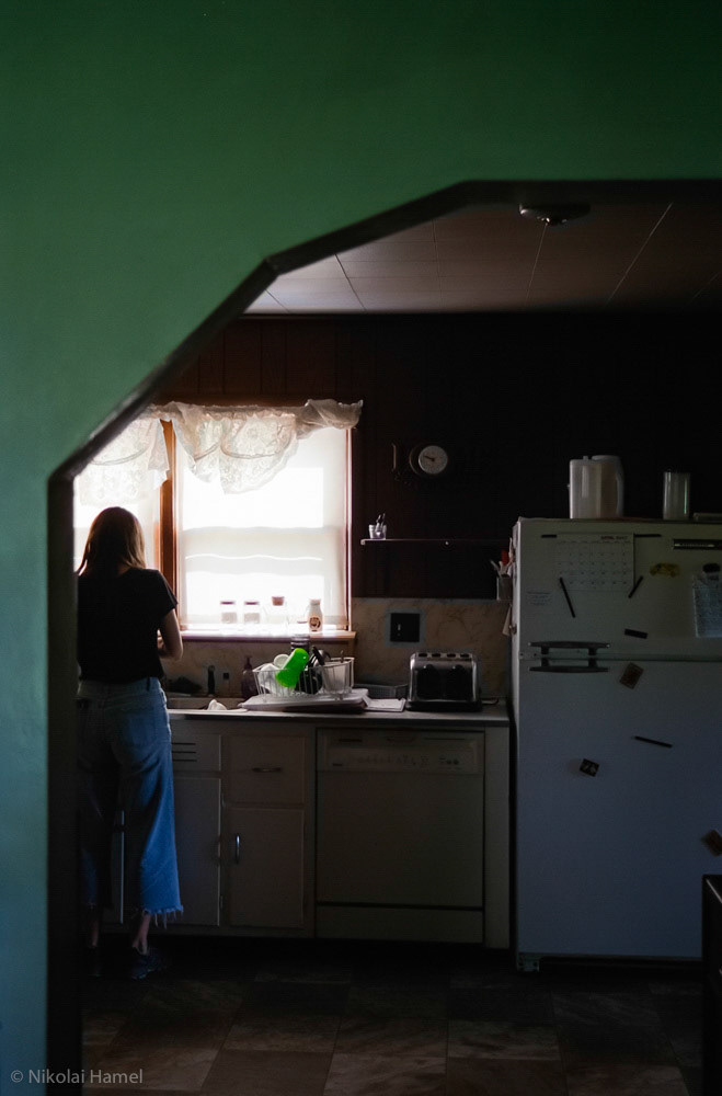 Washing the Dishes. Canon A-1, Kodak Portra 400. Underexposed by 1/2 stops.
