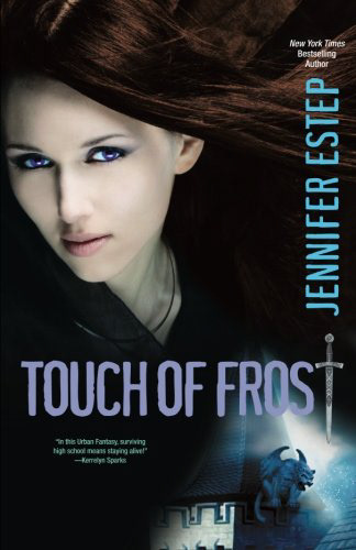 Book cover: A girl with brown hair and purple eyes takes up most of the cover. The rest is black with a gargoyle thing in the corner.