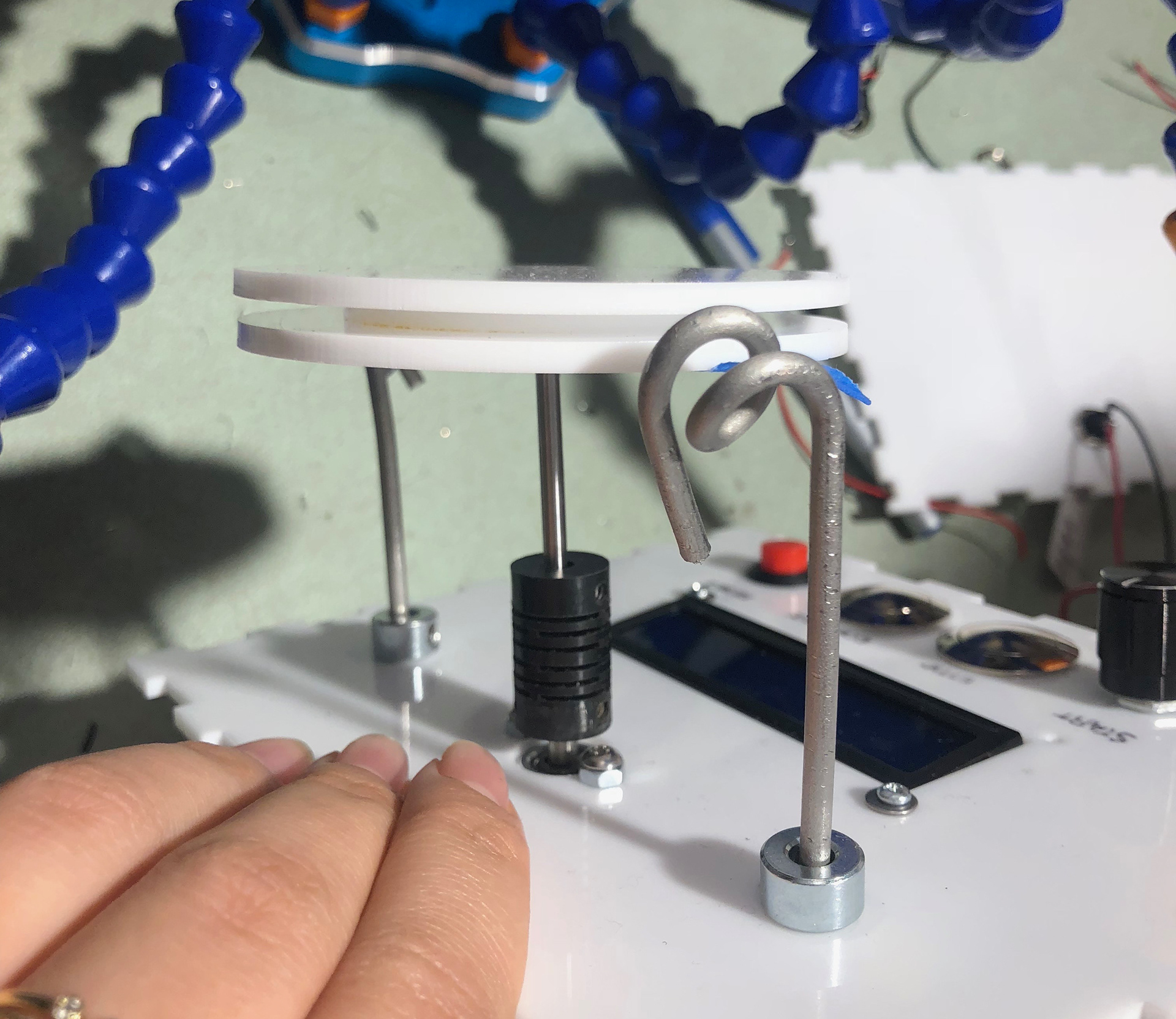 Final Distance Encoder: Metal wires allow for easy usage and larger gap in the disk prevents slipping.