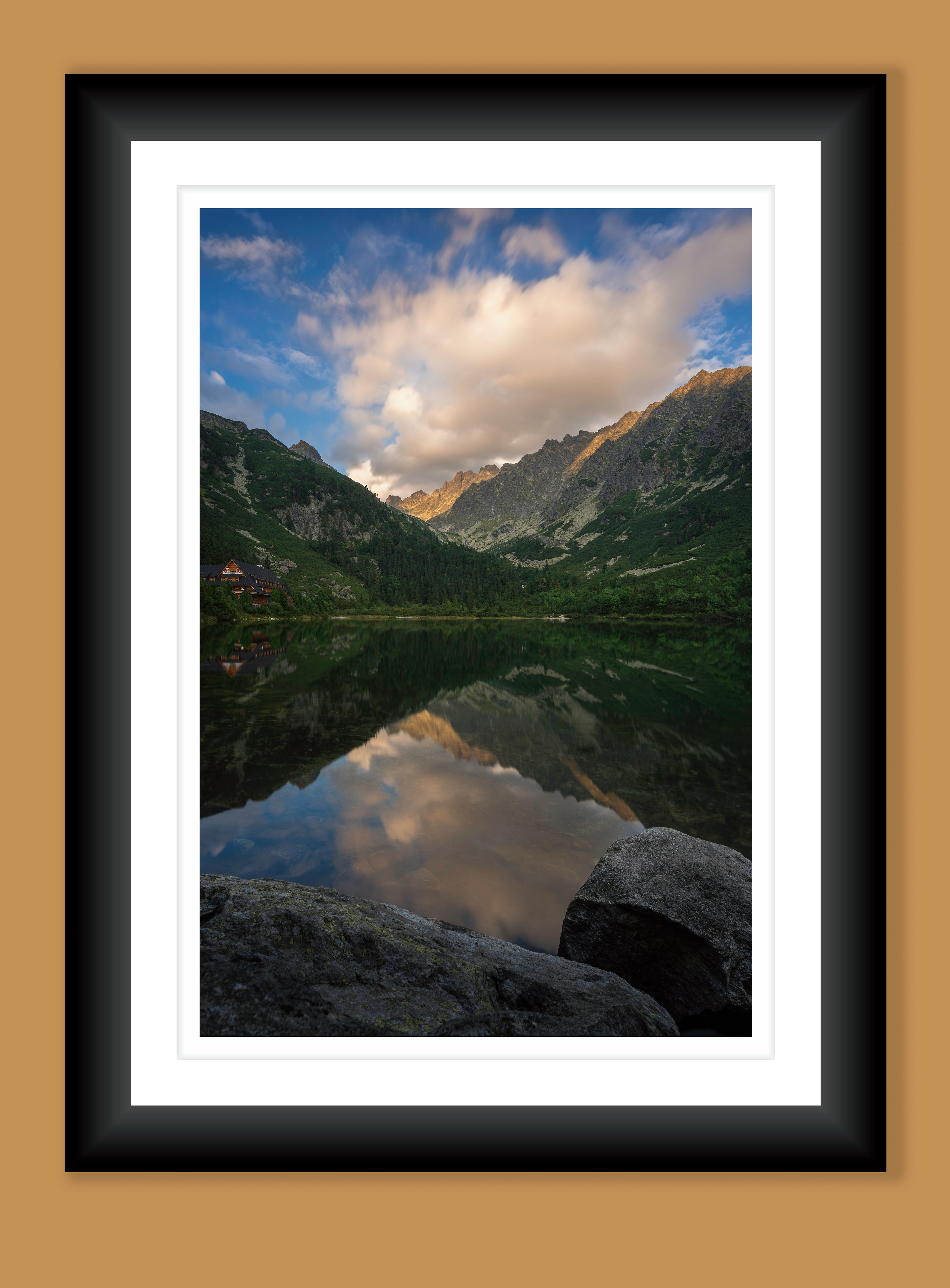 A beautiful fine art print of popraske pleso one of the many natural mountain lakes found in tatry mountains during a calm sunset.