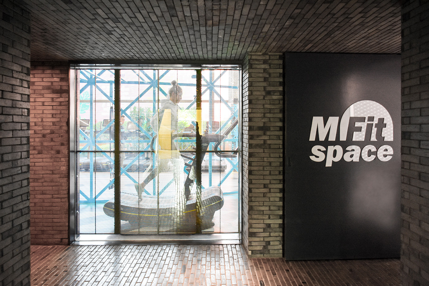 Entrance of the gym MFIT SPACE from the hotel lobby design by RAMOPRIMO