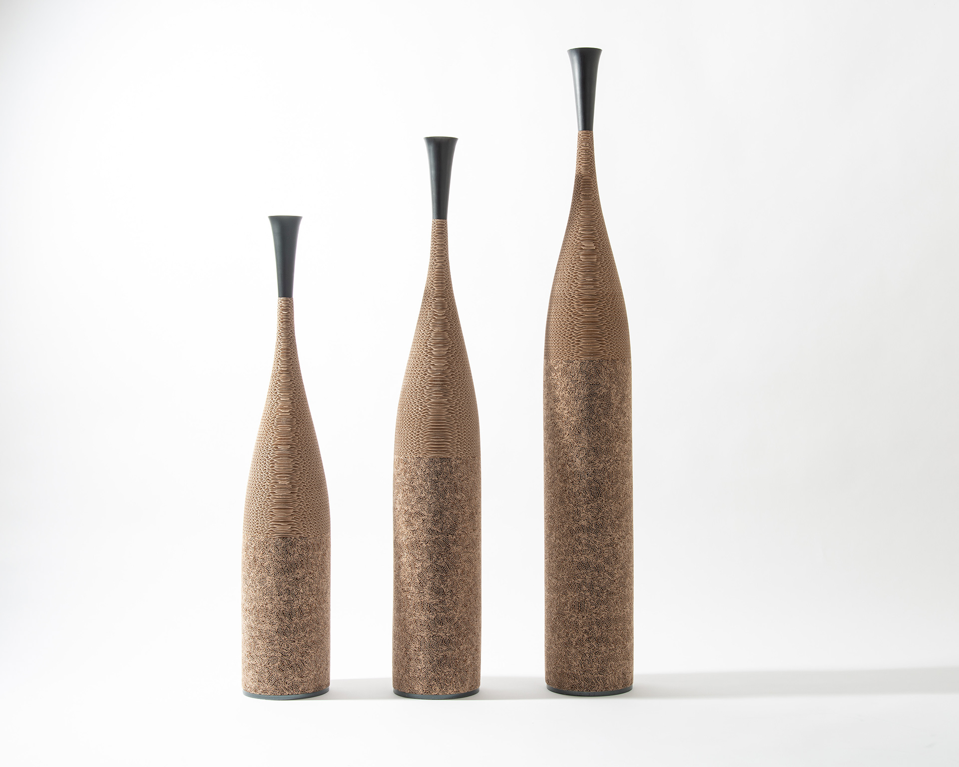 Ensemble trois sculptures 'Les Sages' - Carton - 2 200€