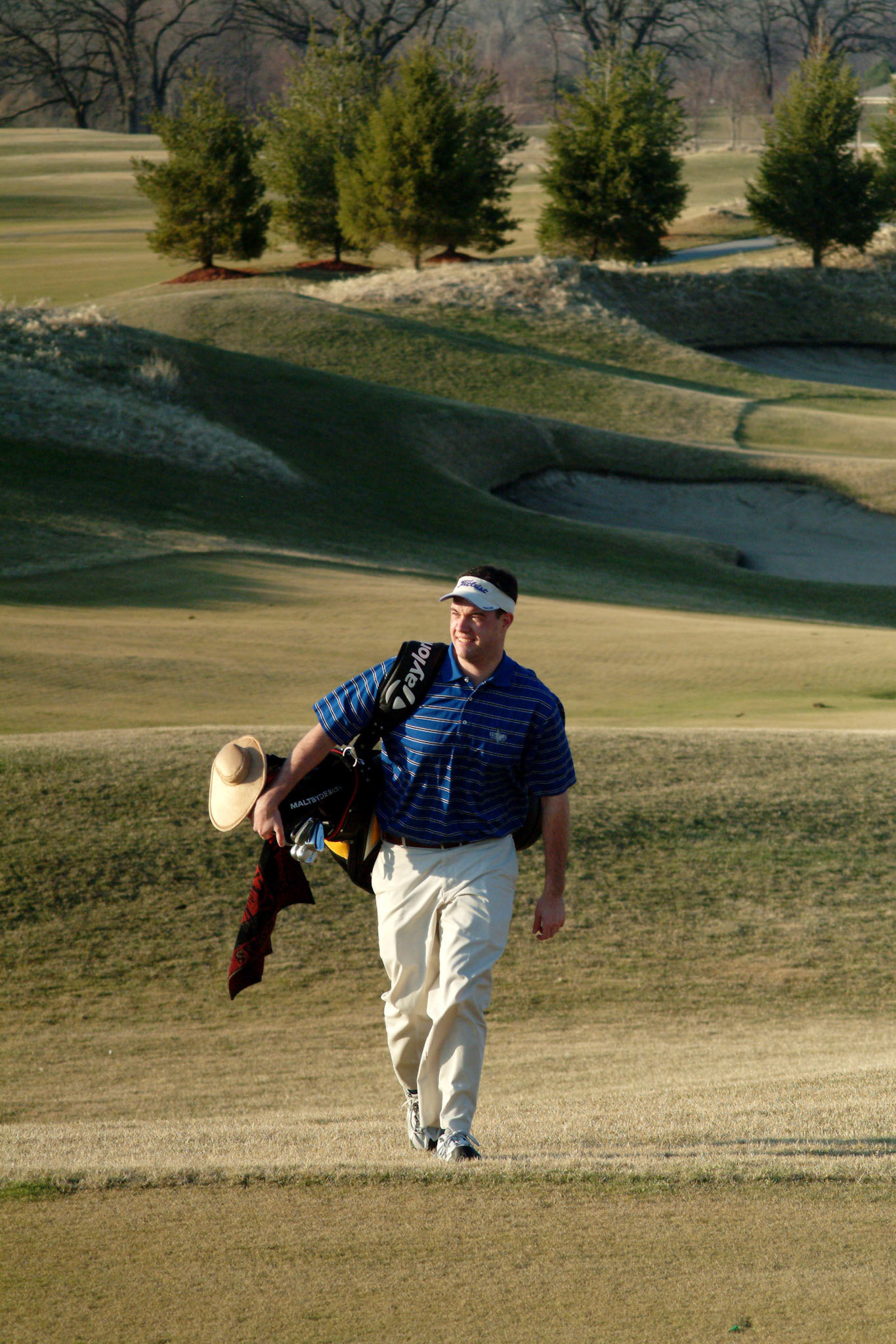 040208tvmGLFPESCHKE_3 Tony V. Martin CROWN POINT-Ed began caddying last year with a player in the Futures at Lost Marsh. CP golfer Ed Peschke is putting down his clubs to pick-up the bag of new client South African golfer Stacy Bregman as he caddies in the European Women's Golf Tour. Ed heads to Spain next week to start his new job.