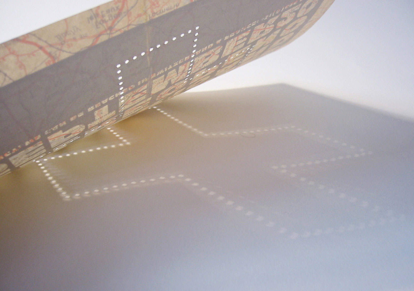Light shinning through the die cut holes