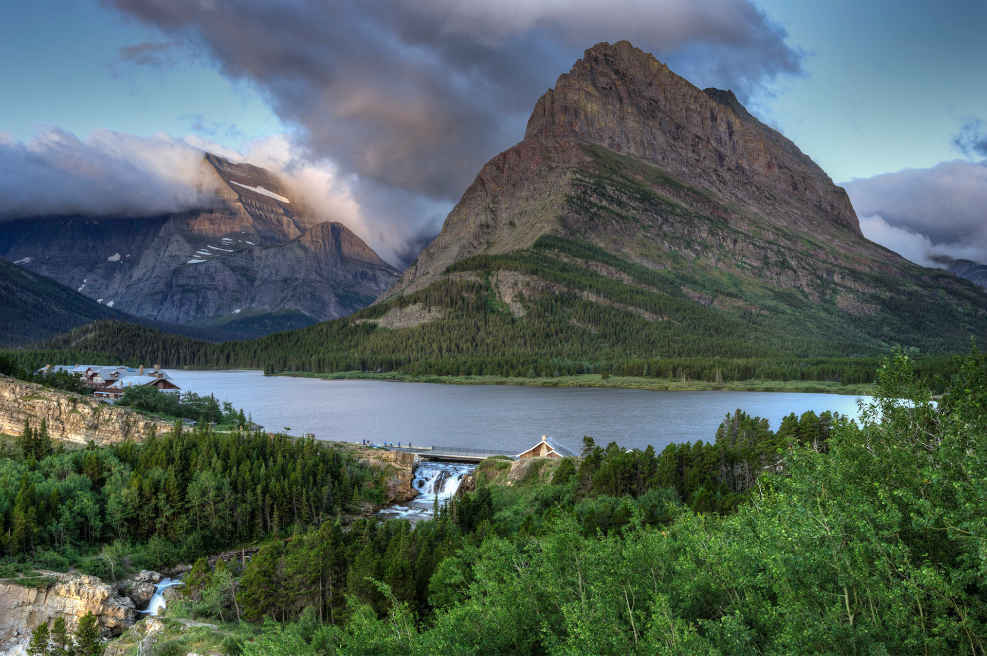 Shortly before sunrise at Swiftcurrent LakeGlacier National ParkMontanaJuly 28, 2015This is an HDR image consisting of 5 exposures merged in Photomatix Pro. Additional processing in Lightroom and Photoshop.PENTAX K-3, SIGMA 18-35mm F1.8 DC HSM A013ISO 100 26 mm  ¼ sec at ƒ / 11