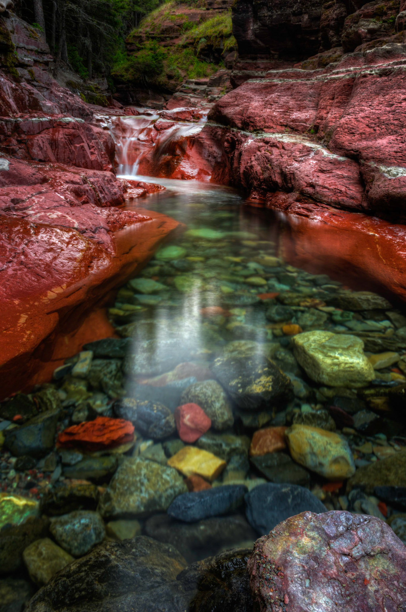 Red Rock CanyonWaterton Lakes National ParkAugust 2, 2015This is an HDR image consisting of 5 exposures merged in Photomatix Pro. Additional processing in Lightroom and Photoshop.PENTAX K-3, Sigma 18-35mm f/1.8 DC HSM ArtISO 100 18 mm  1.6 sec at ƒ / 16