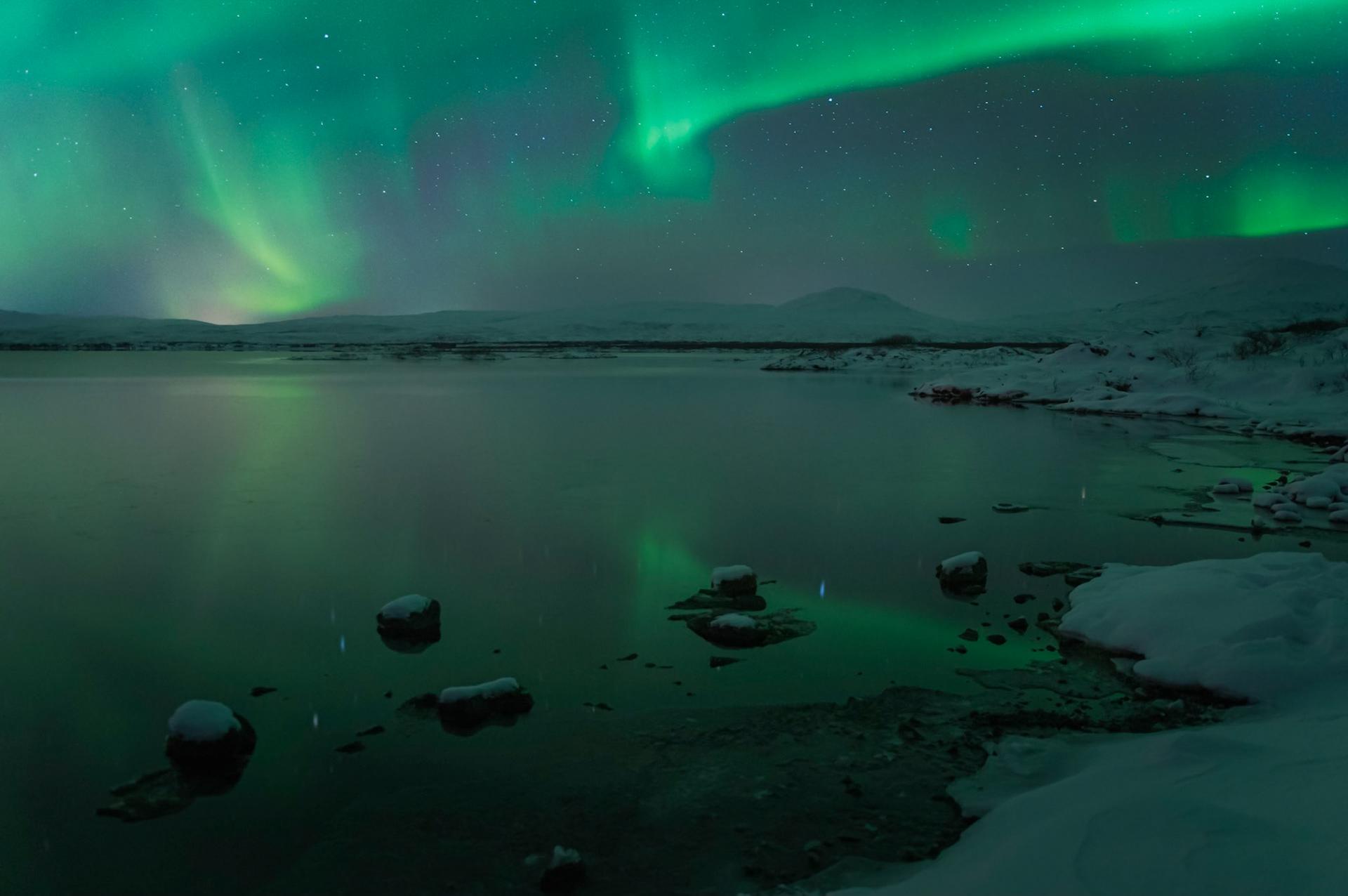 The Aurora Borealis, over Þingvallavatn.Þjóðgarðurinn á ÞingvöllumSuðerland, IcelandJanuary 31, 2016Pentax K-3, SIGMA 18-35mm F1.8 DC HSM A013ISO 400 18 mm  15.0 sec at ƒ / 1.8