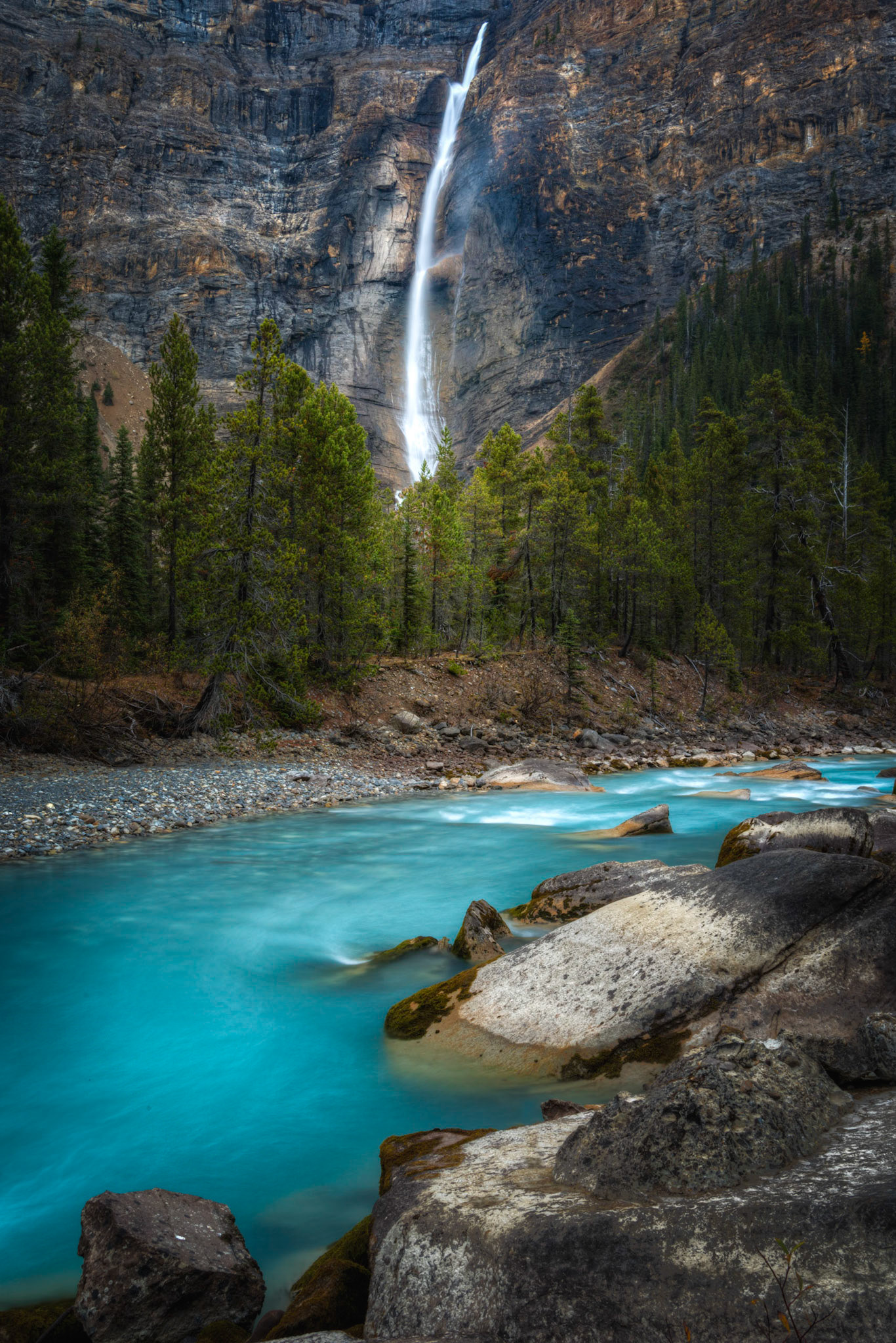 Takakkaw Falls, and the Yoho River, in the Yoho Valley.Yoho National ParkBritish Columbia, CanadaSeptember 22, 2016This is an HDR image consisting of 5 exposures merged in Photomatix Pro. Additional processing in Lightroom and Photoshop.PENTAX K-1, TAMRON 28-300mm F3.5-6.3 Ultra zoom XRISO 100 34 mm  2.0 sec at ƒ / 18