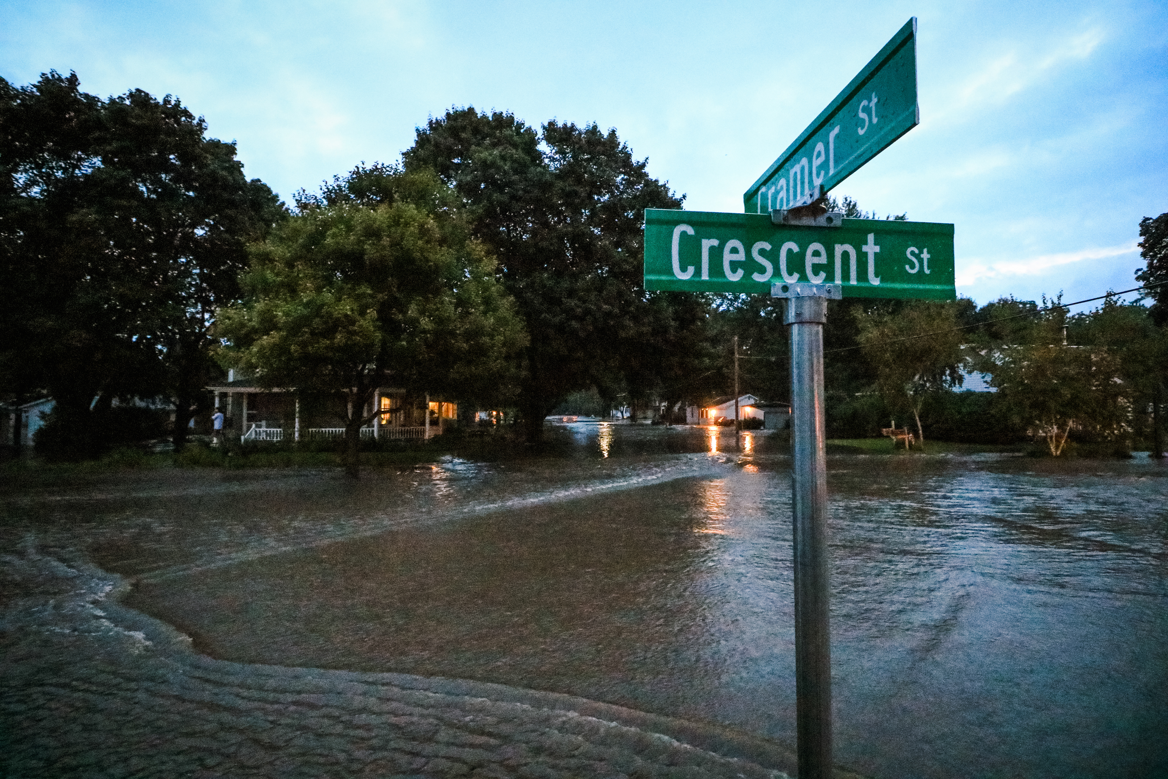 Cramer and Crescent street in Mazomanie are covered by fast moving flood waters in the early morning hours of August 21, 2018.