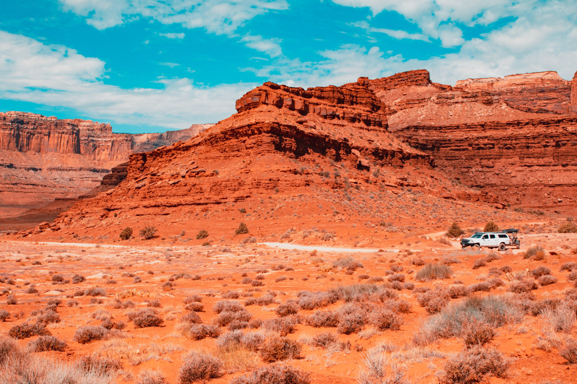 I love how the landscape dwarfs the truck and trailer