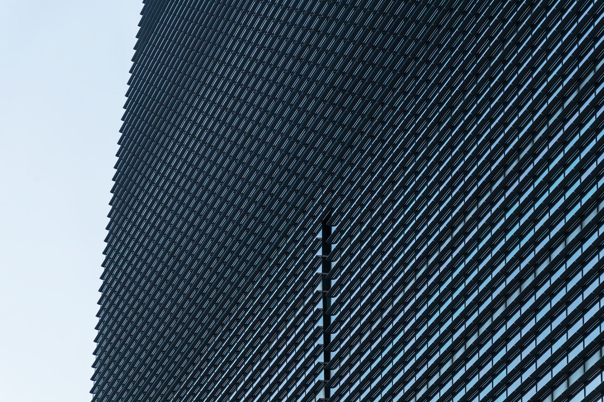 Windows and walls of high-rise buildings in Nihonbashi at dawn. This image was taken in October, Chuo Ward, Tokyo, Japan.