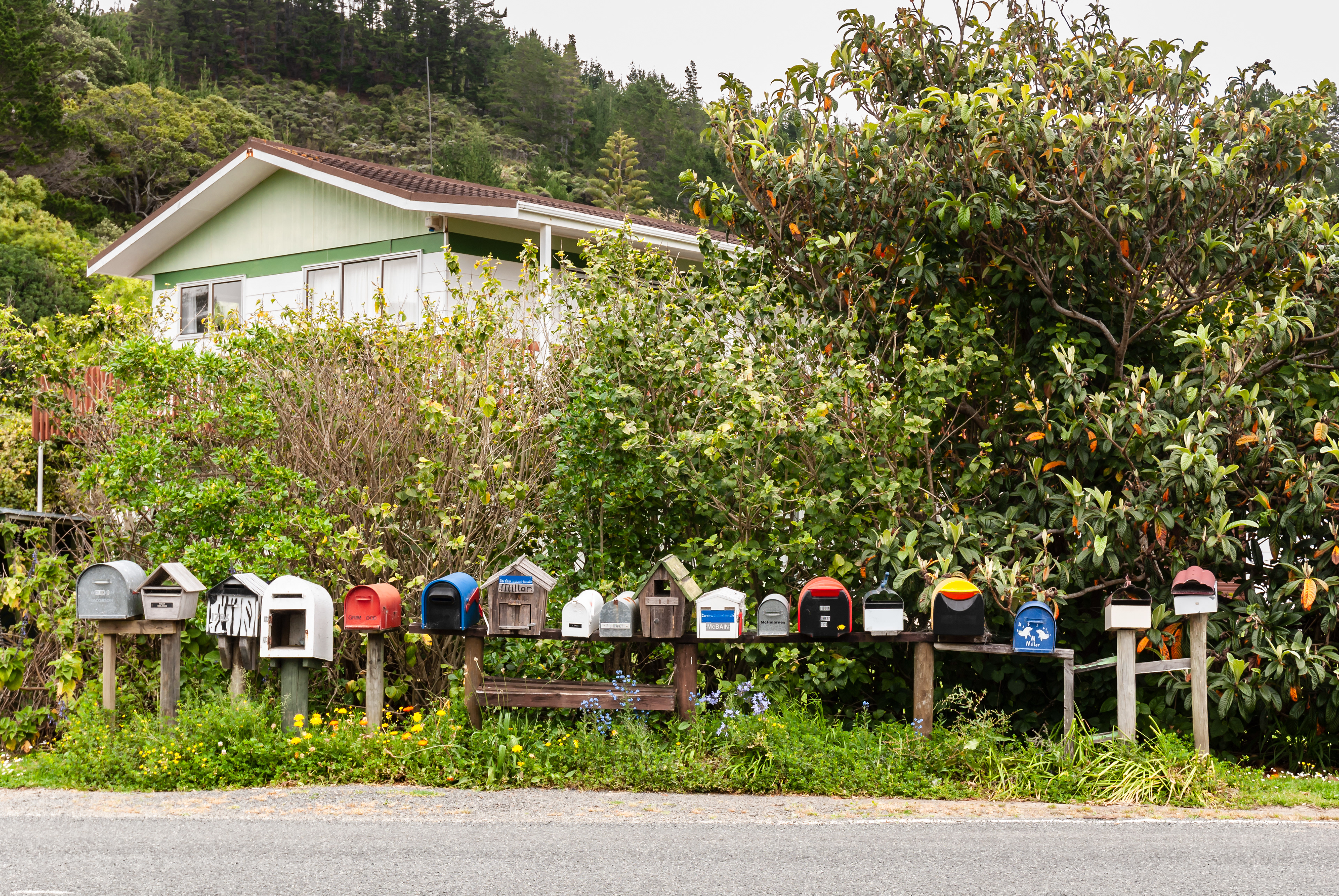 Village mail boxes altogether on the roadside, Northland, New Zealand