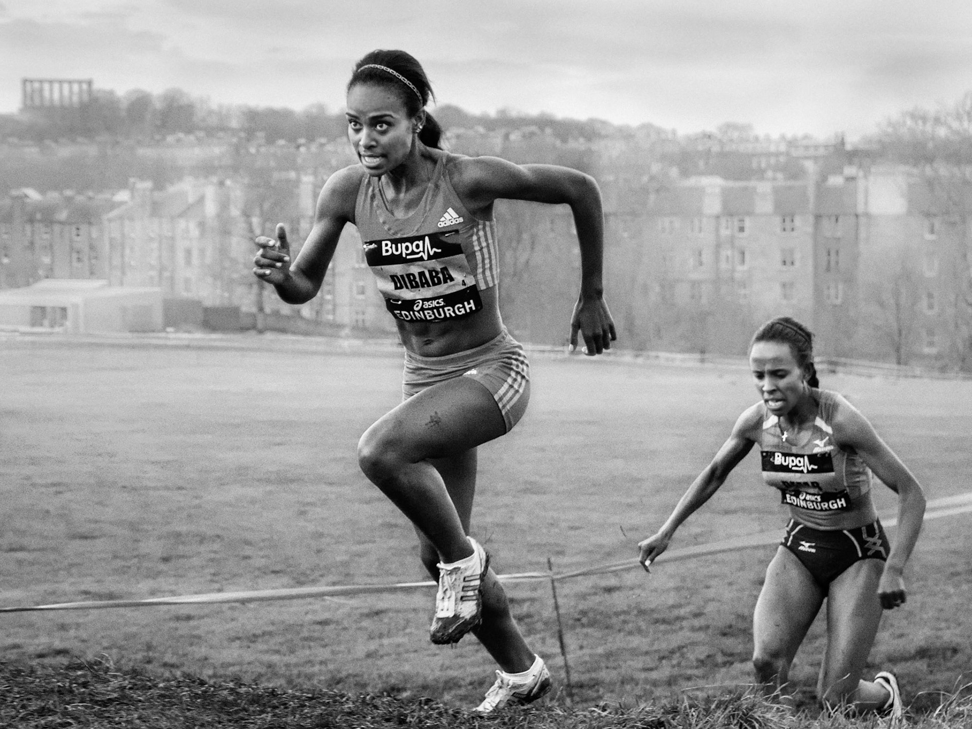 The Ethiopian runner Genzebe Dibaba powers ahead to lead and win the Womens International 3km event at the BUPA Great Cross Country Run in Edinburgh, January 2013. I was struck by the difference in expression of Dibaba with that of her nearest rival and fellow Ethiopian, Meseret Defar.