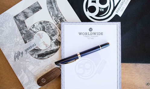 50 Years in Review Booklet (saddle stitched), pen, notepad, tote bag and matching USB