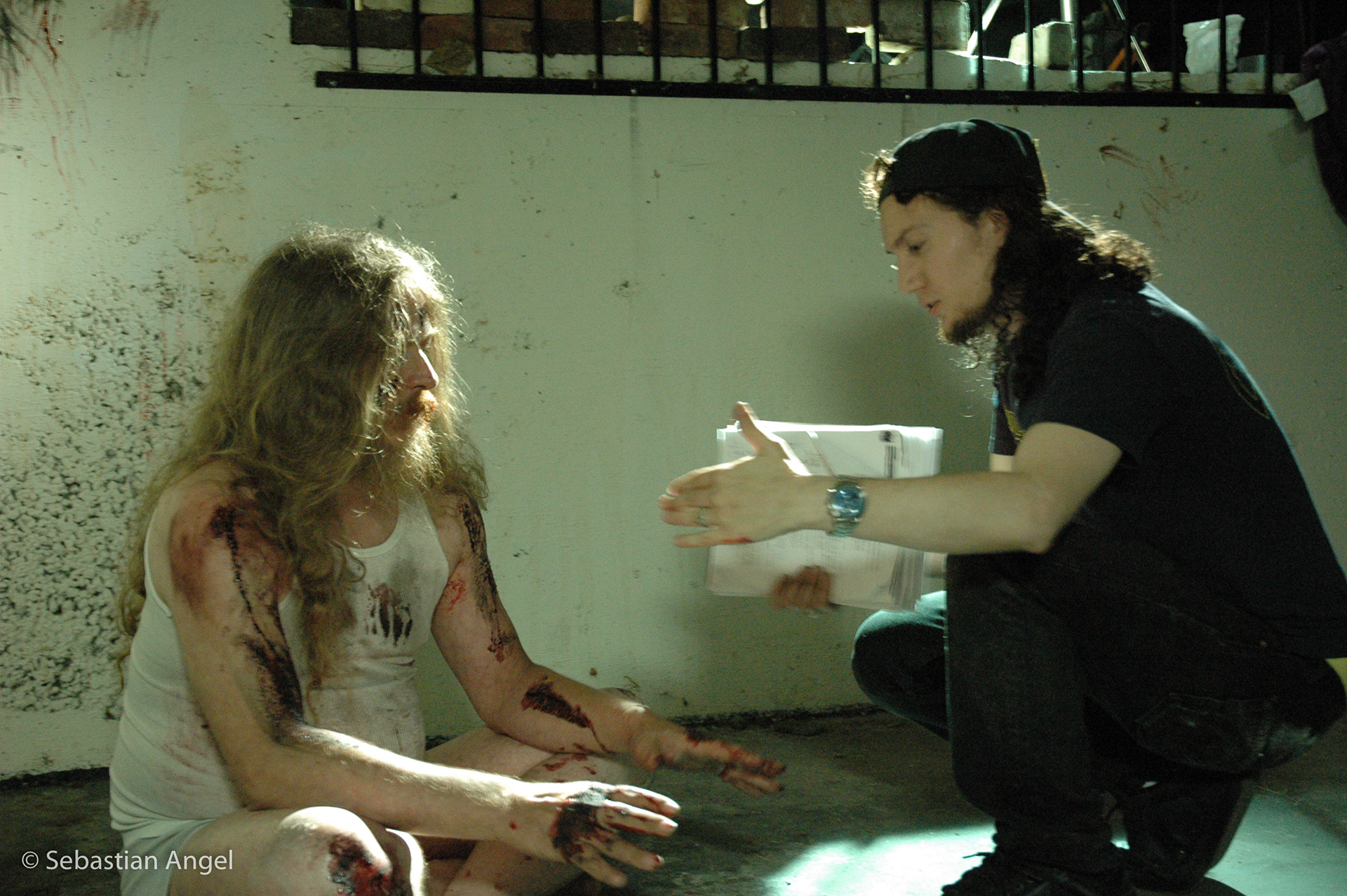Director Sebastian Angel and Actor Norman Hirschfeldt discussing the scene.