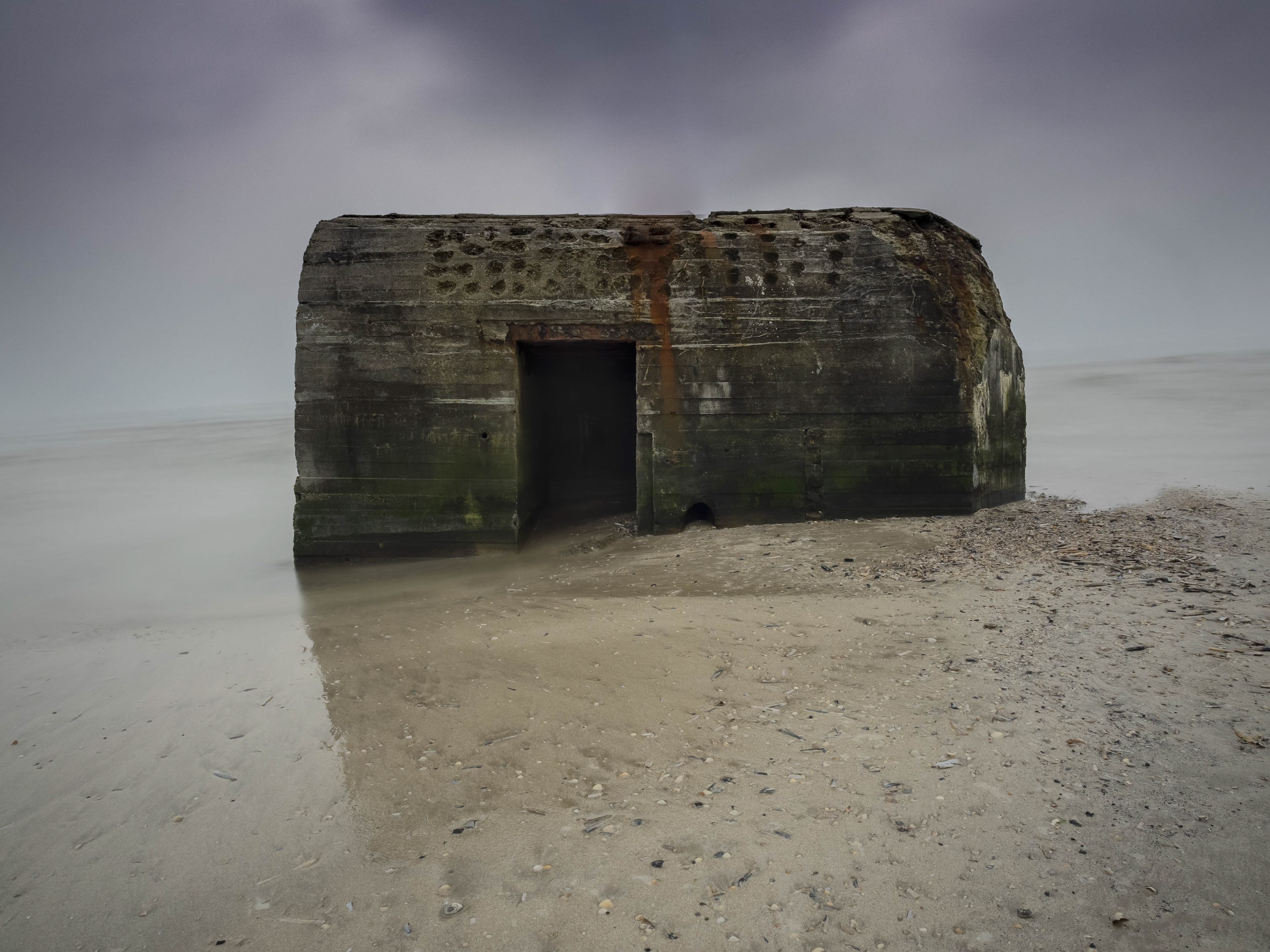 Dramatic View: Bunker slides into the Sea