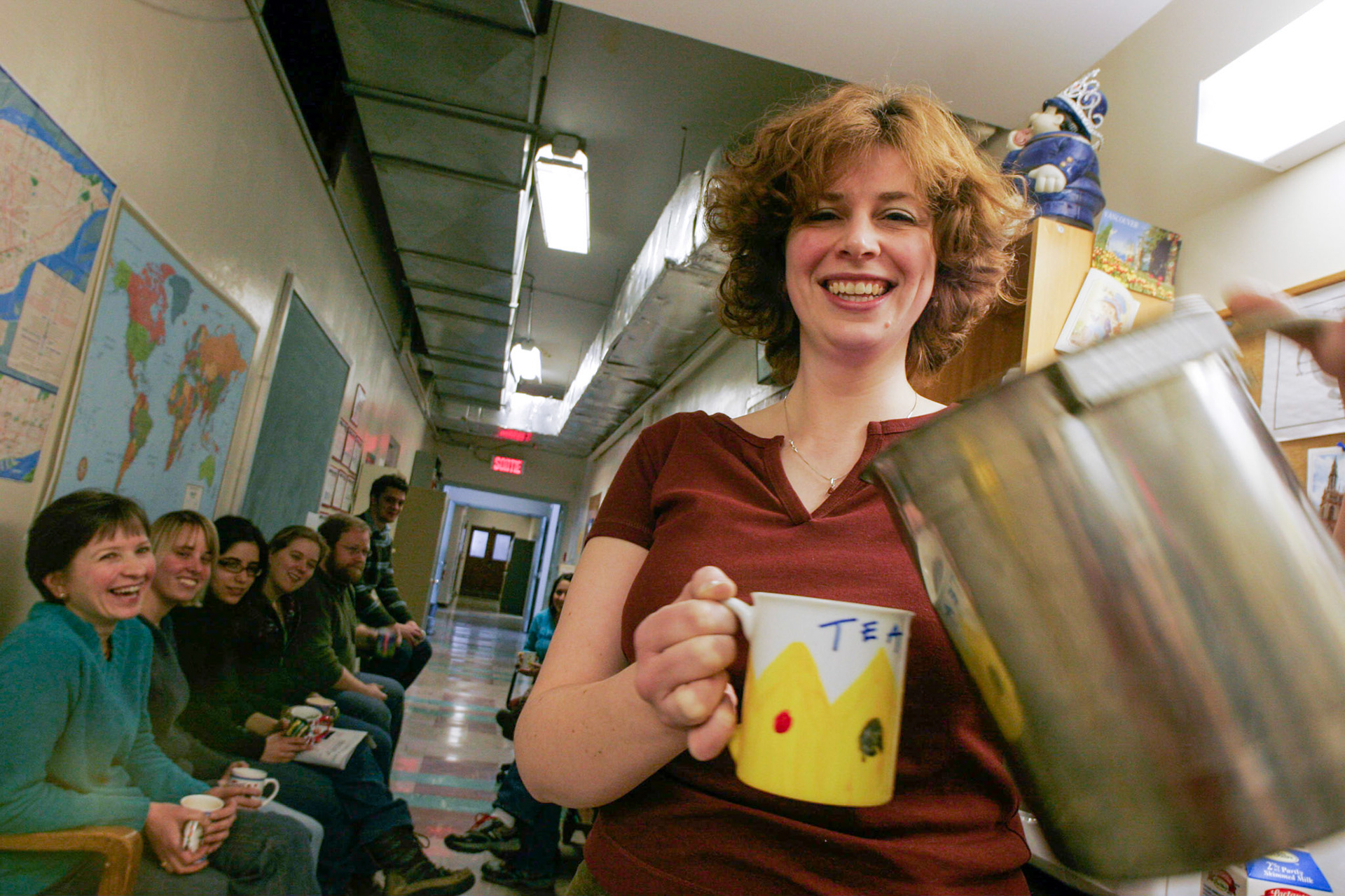  The “3rd Floor Tea Club” is a ritual that began in the 1940s or 50s at the Pulp and Paper Institute. Here, Maggie Weller distributes Earl Grey to the assembled from the “tea infusion device.” 