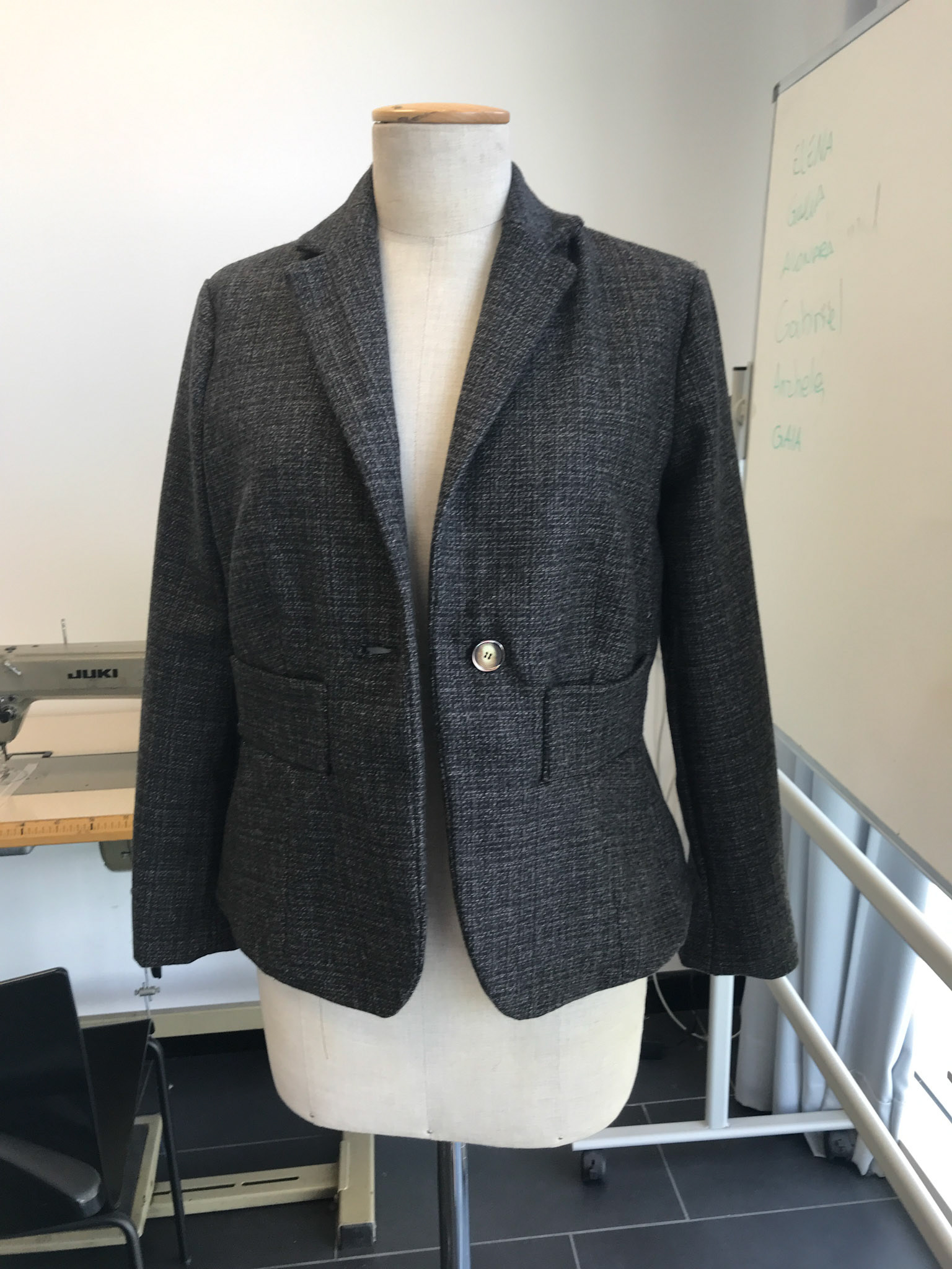 Jacket with lapel collar and pockets