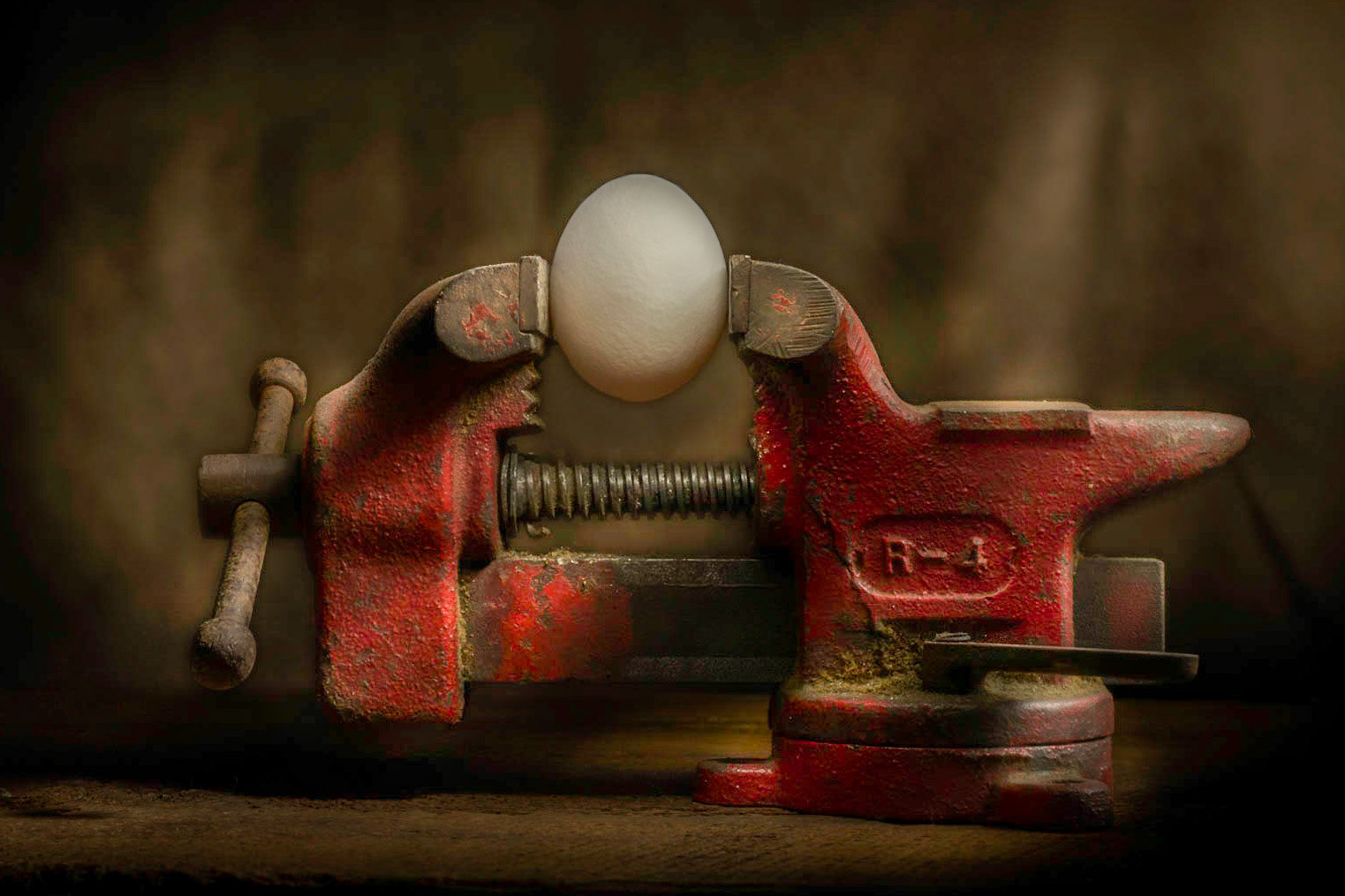 An egg in a vise. Having some fun with light painting