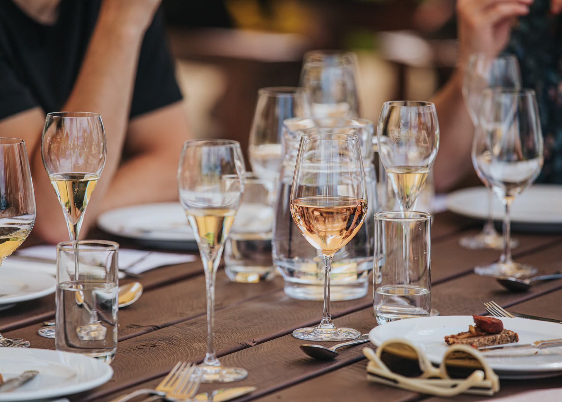 Table setting with wine options at Church Road Winery