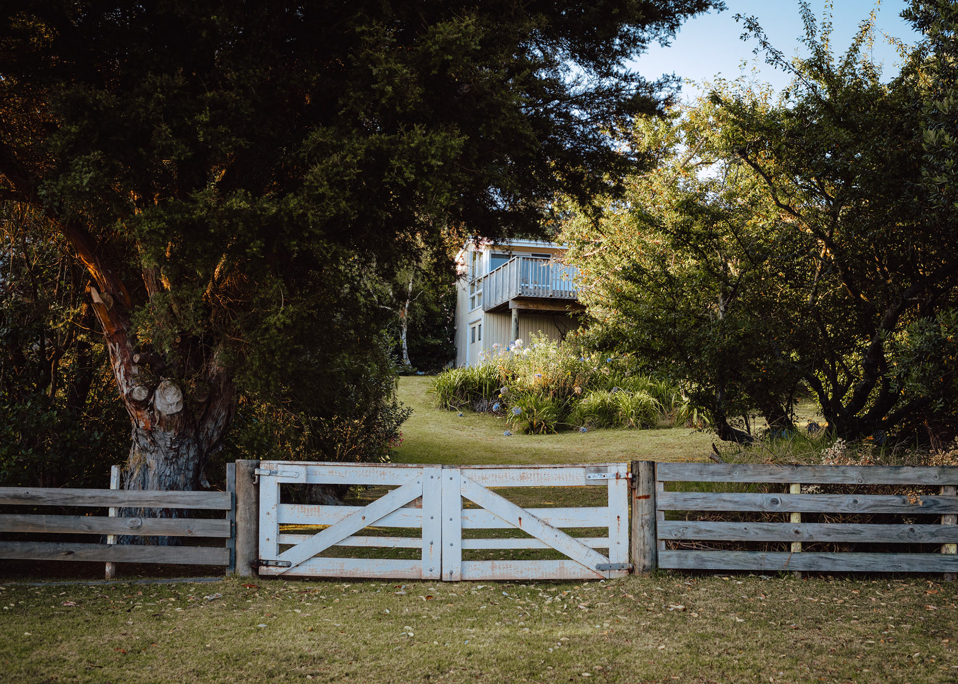 Bach (holiday home) gate looking up to the house