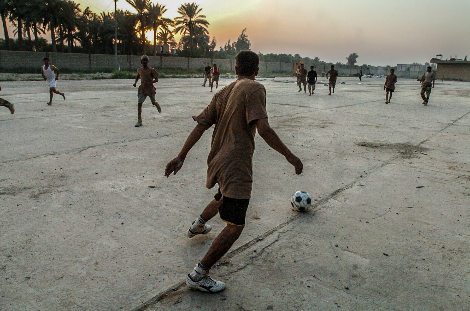 Iraqi soldiers playing soccer at FOB Yusafiyah, Iraq