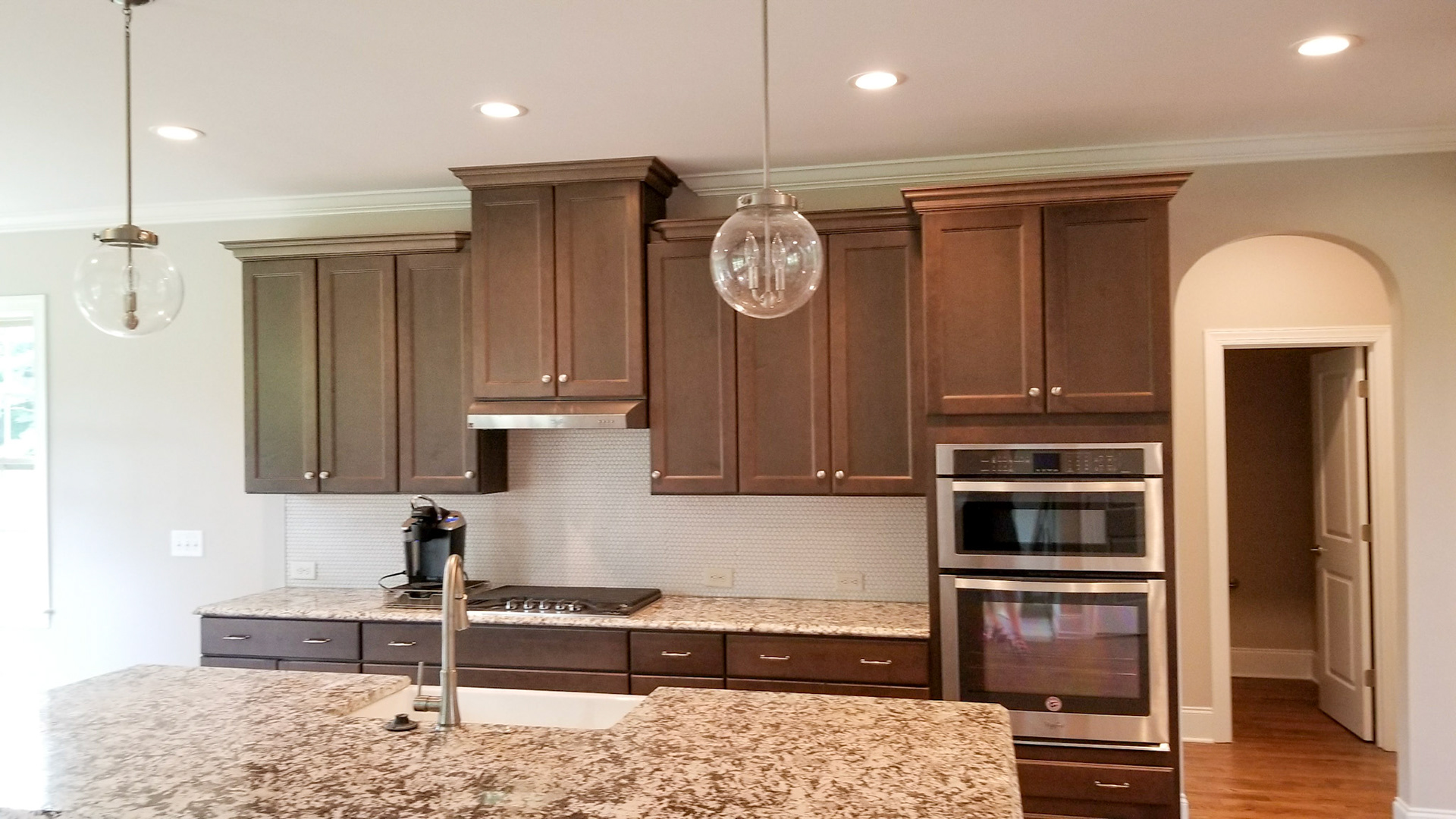 Personal Selections: Cabinets, counters, flooring, tile, paint colors, hardware, and lighting.