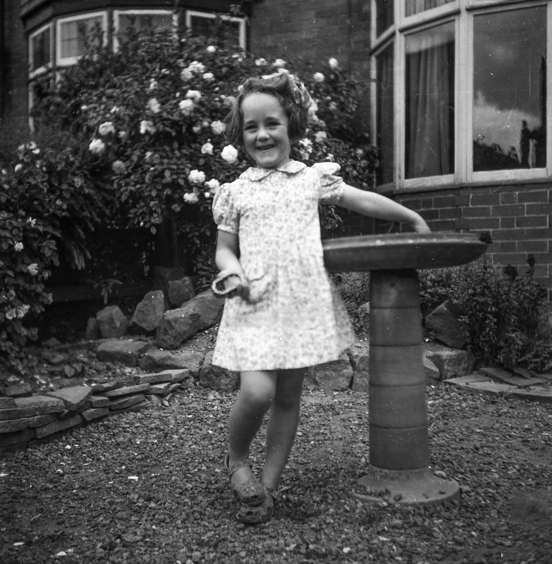 Laurene by the bird bath