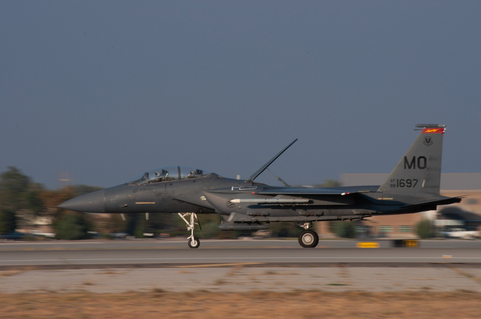 697 Panning: A/C 697, landing sequence, 20201002 @ 1820 evening sun, Mountain Home AFB, Miller, I wanted to find a subject that I could capture in high speed during different times of the day and play with the light source. The evening sun was perfect while I was capturing these landing shots. I love how the plane looks frozen on a moving backdrop. Camera Settings: Nikon D500, ISO 200, 180mm, f/22, 1/80s