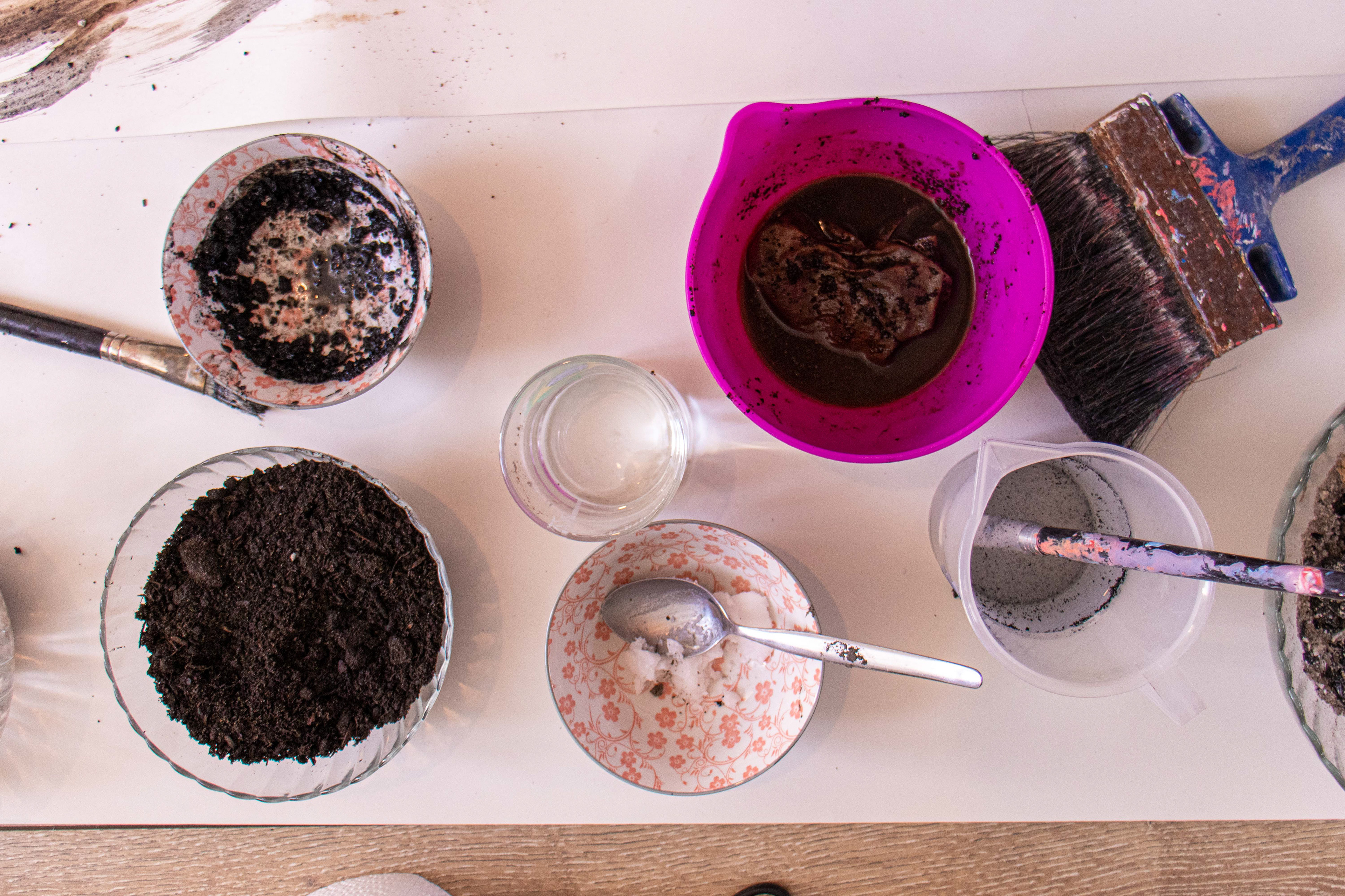 Soil, wet soil, ash mixture, coffee grounds, coconut oil