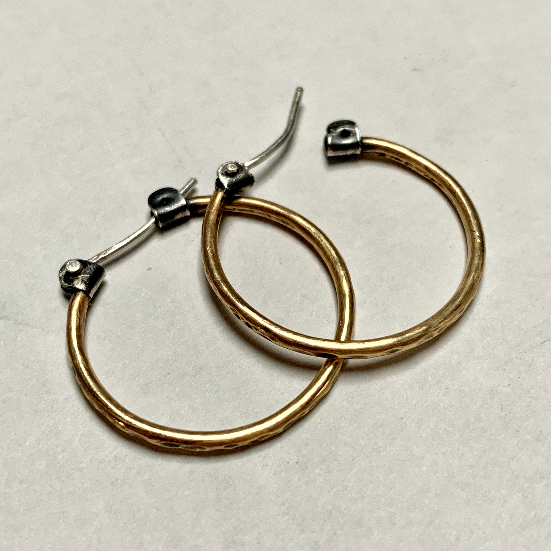 hinged brass hoops