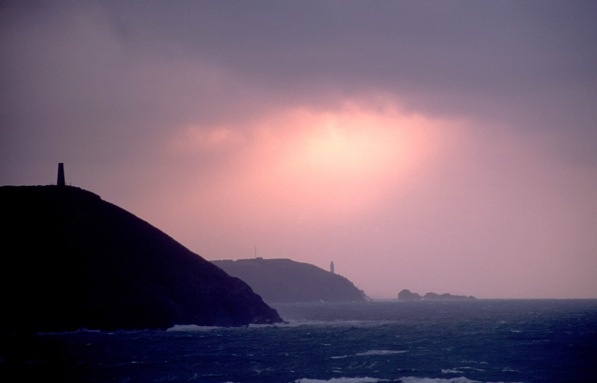 STEPPER POINT SUNSET STORM. An original photograph by Chris Rose. Image size: 29cm x 44cm. For Sale: £18