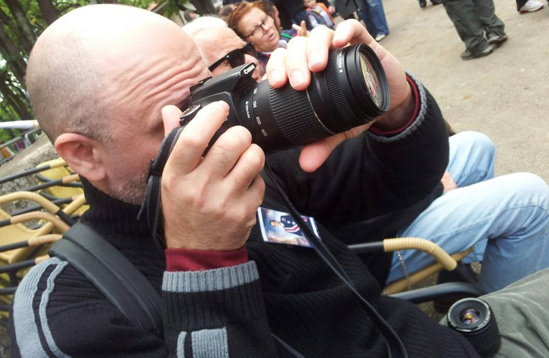 Photojournalist at public event in Serbia (2013)