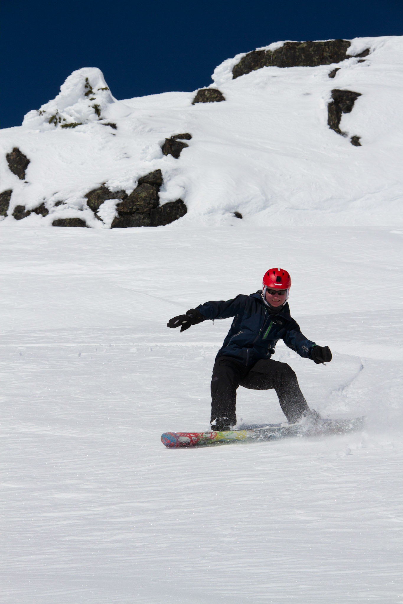 Alex boarding in powder