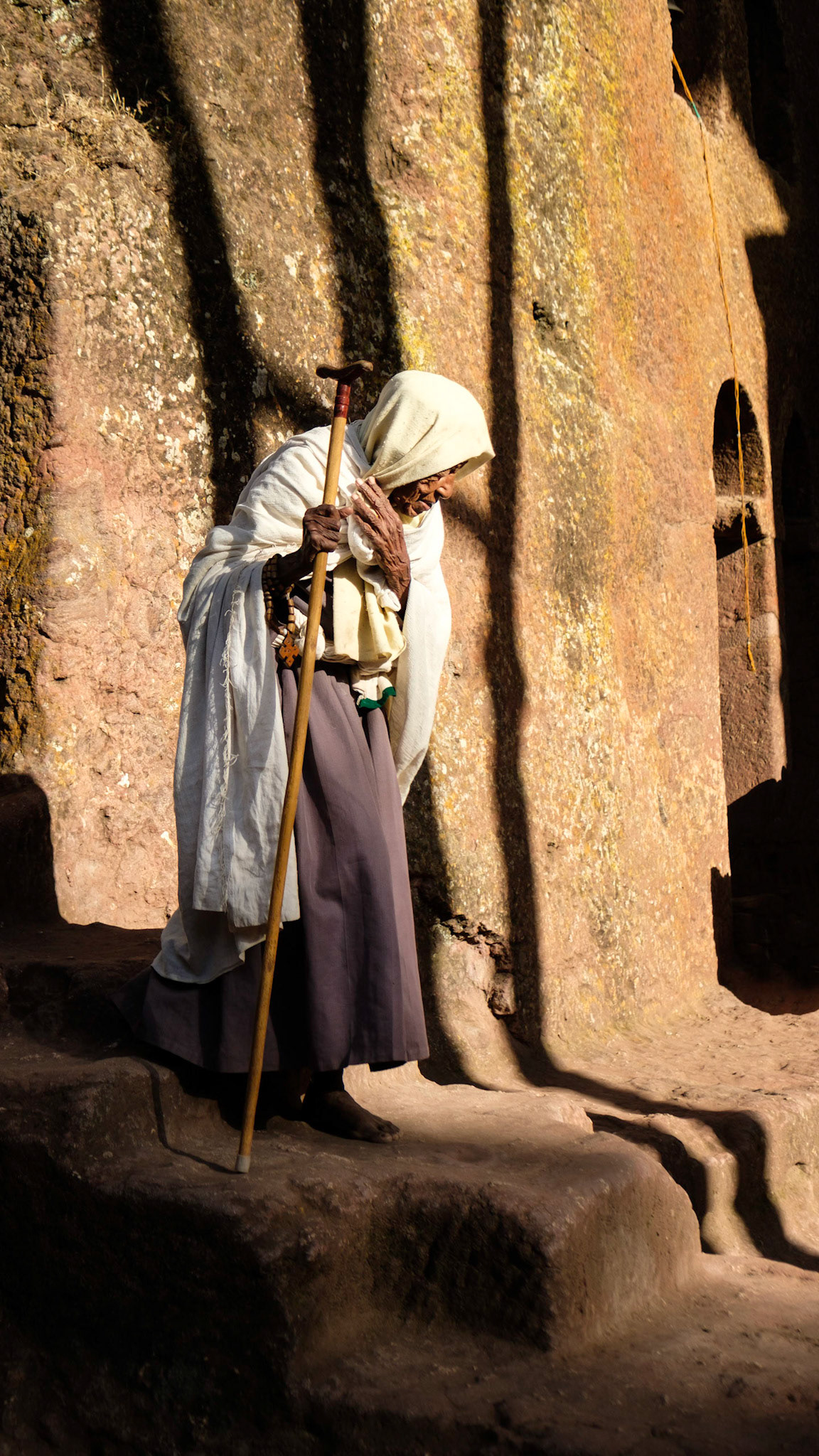 Woman Departing Bet Danaghel - Lalibela, Ethiopia