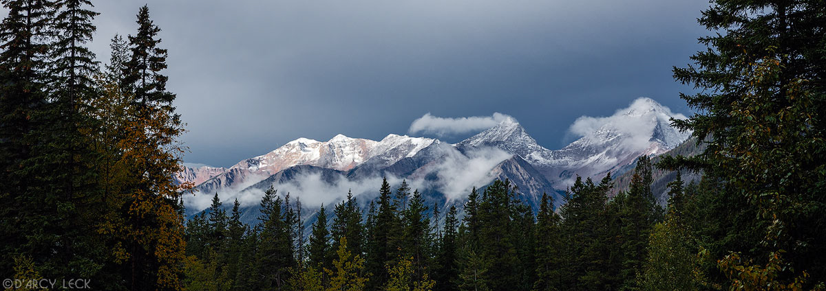 Autumn snow and clouds cap the Van Horne Range in Yoho National Park, British Columbia, Canada