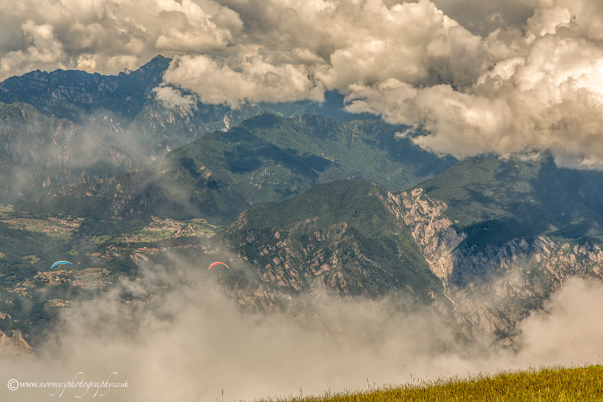 Paragliders into the clouds