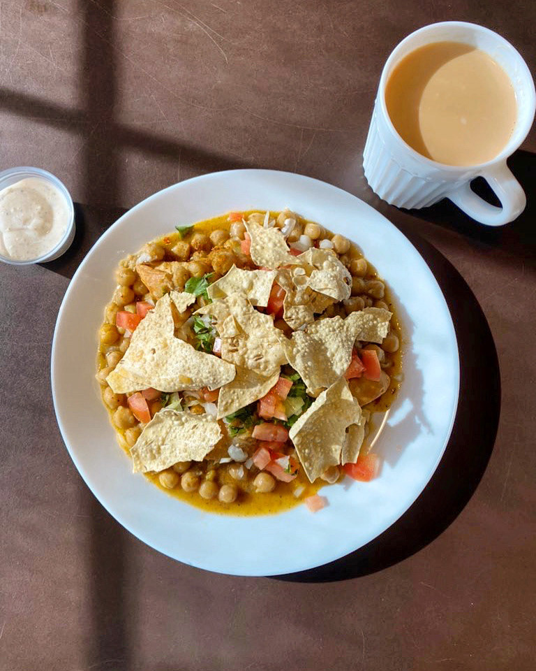 Samosa chaat and a cup of masala chai.