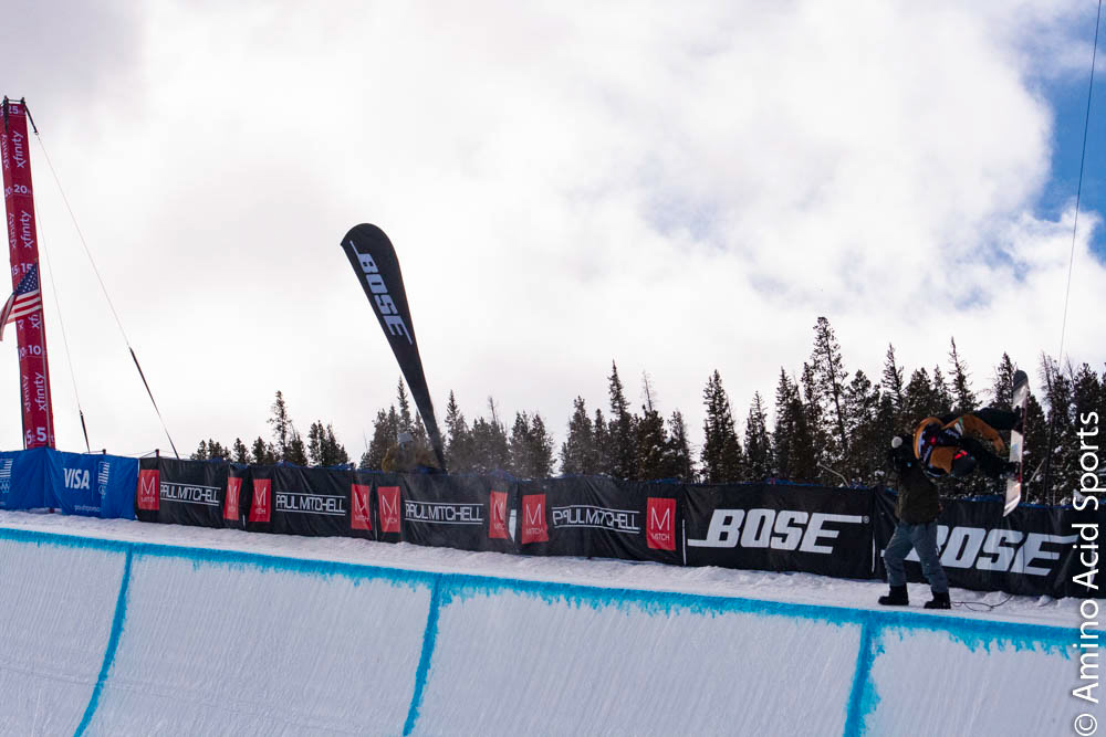 Nippon's Yuto Totsuka soars outta the halfpipe right wall on his spin of his Yonex board. He does not finish the run 2 and takes a scratch score.....