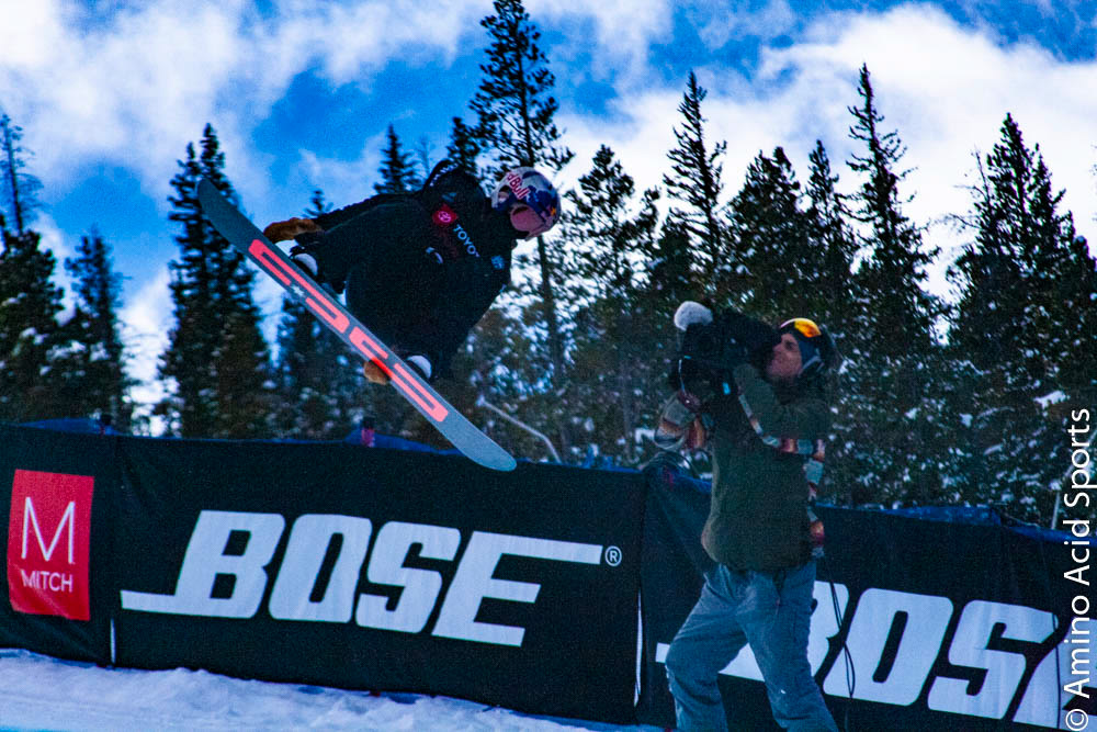 Toby Miller cuts through the cold December air on his back flip in the halfpipe