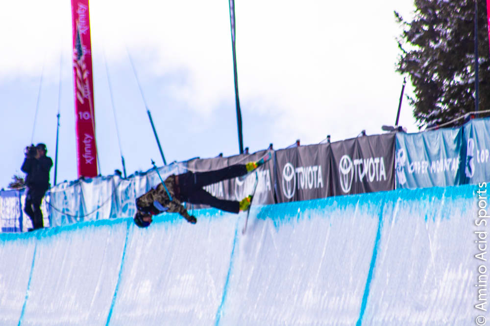 On his 1st Run, Tahoe's David Wise corks his 900* heli mute grab.